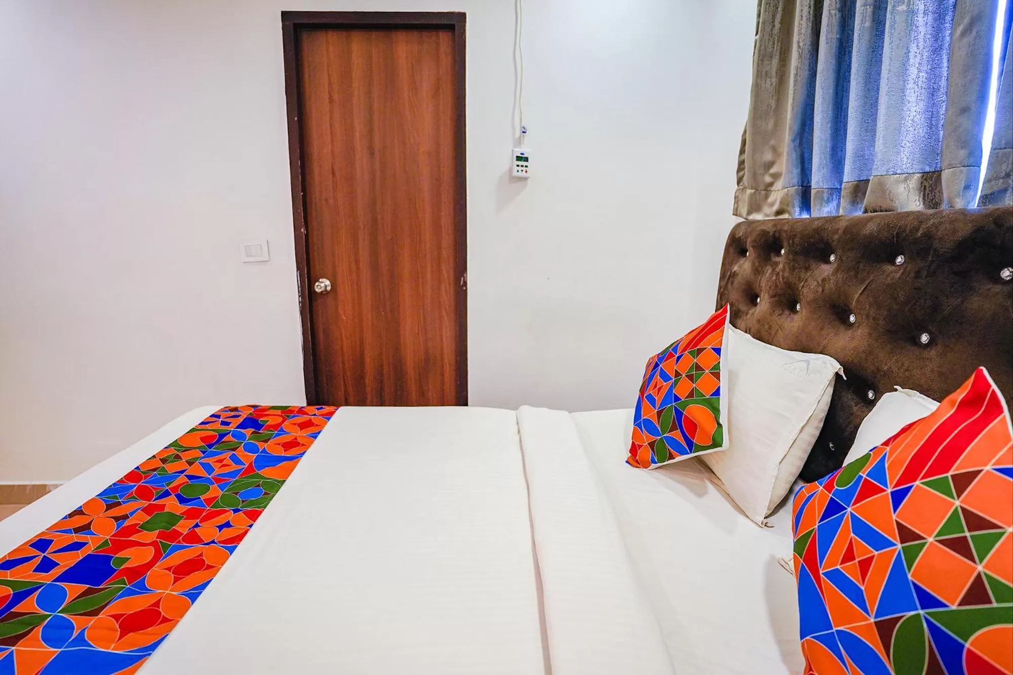 Bed in FabHotel Earth