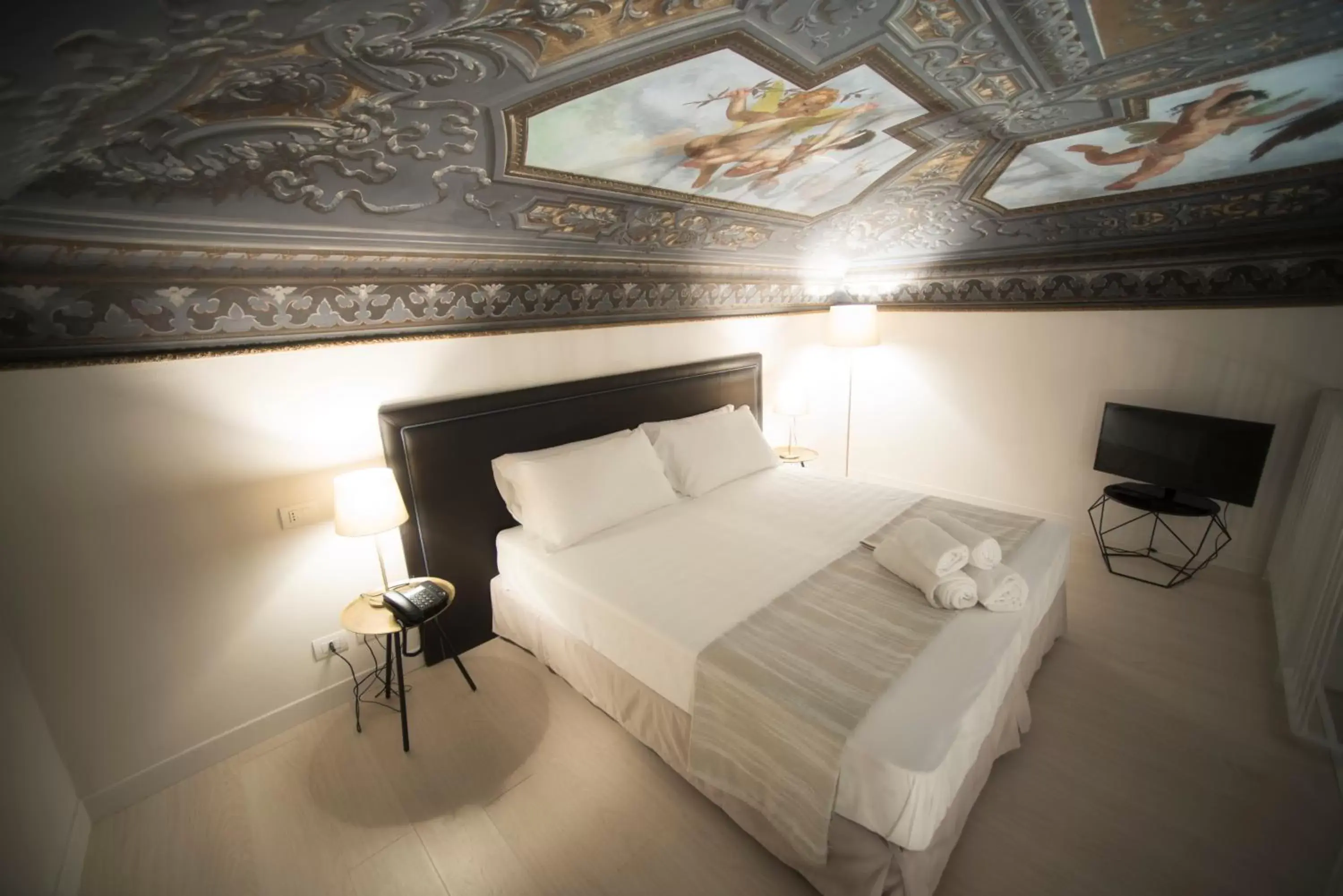 Bed in Hotel Palazzo Vannoni