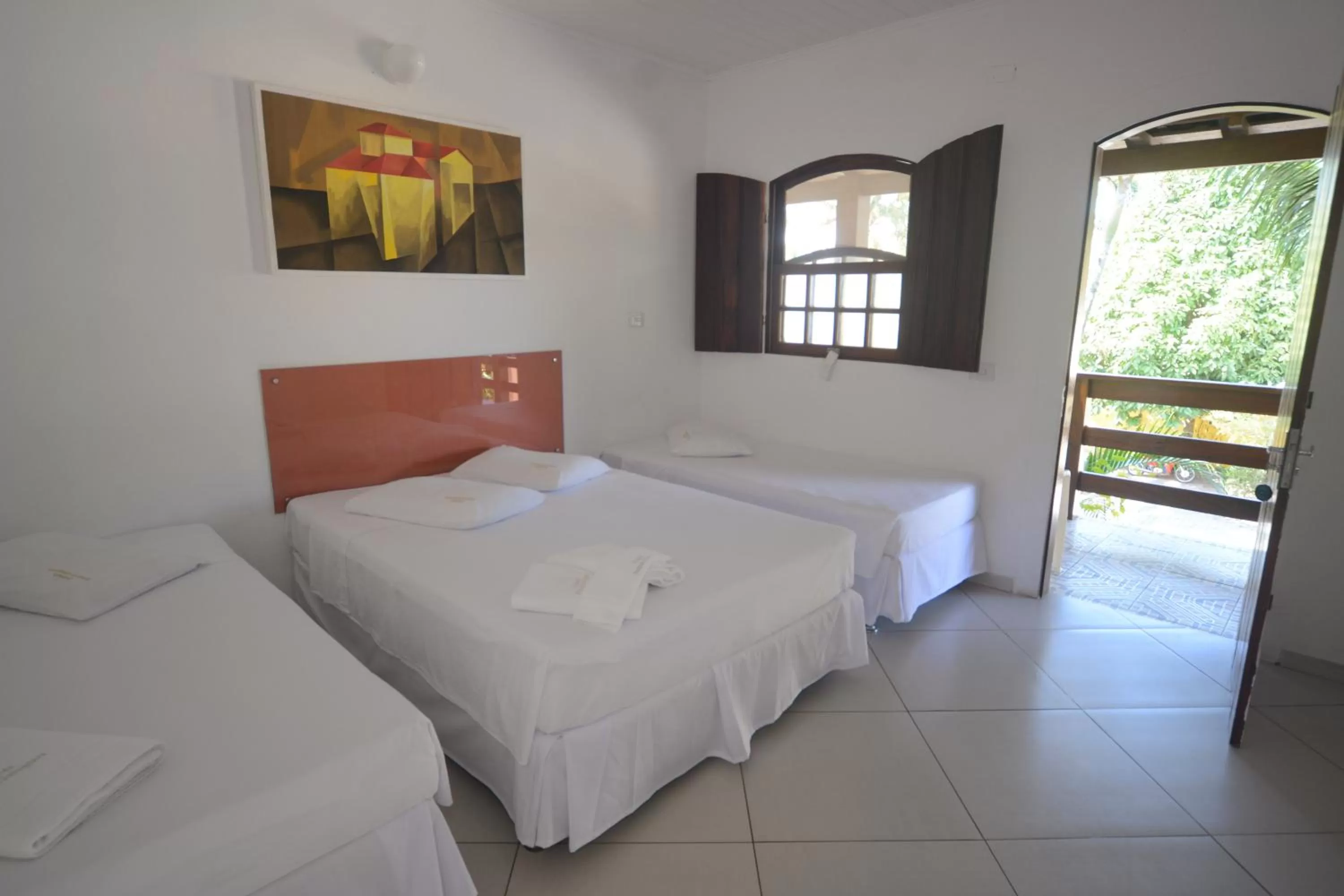 Photo of the whole room, Bed in Pousada Praia do Jabaquara