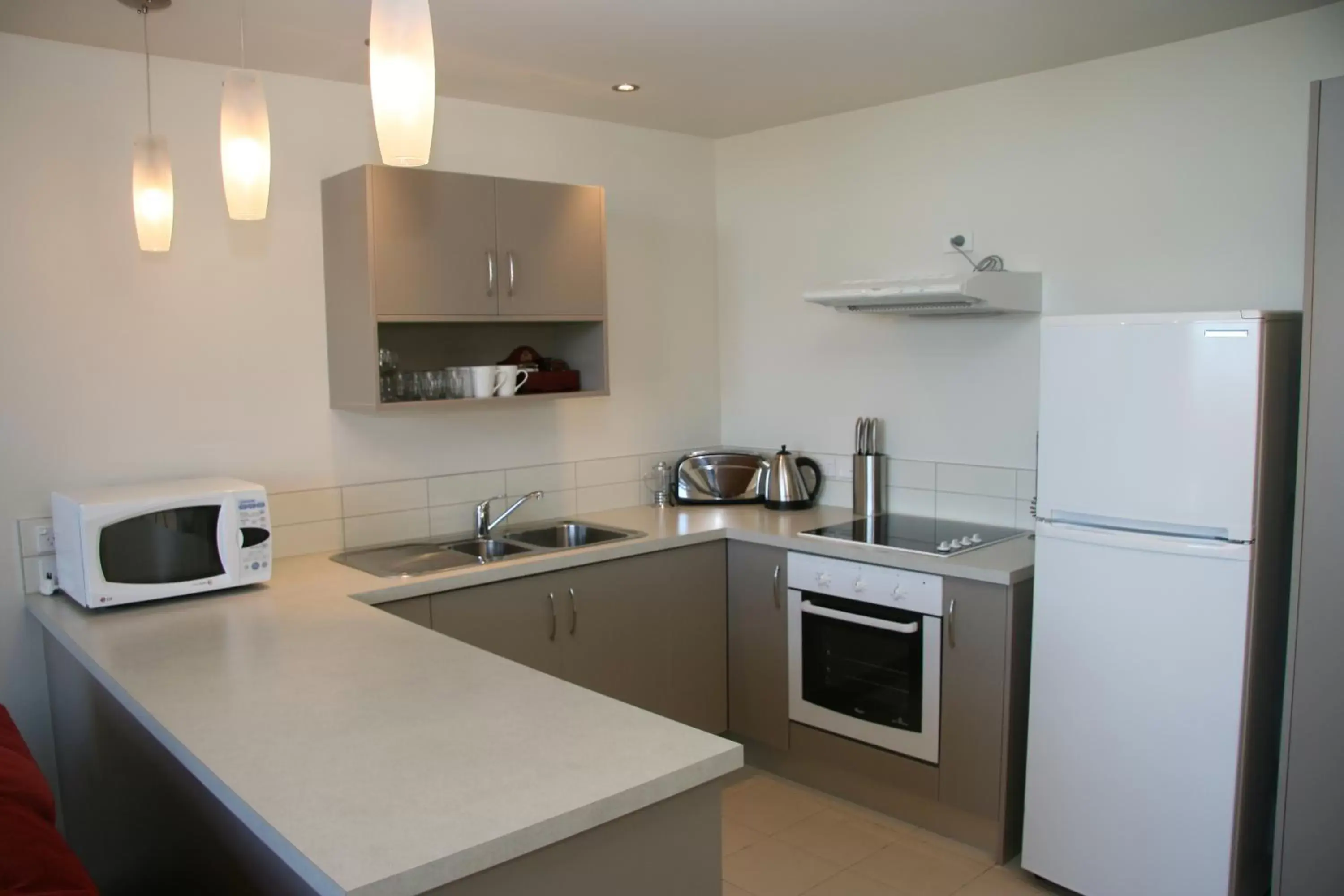 Kitchen or kitchenette, Kitchen/Kitchenette in Oceans Resort Whitianga