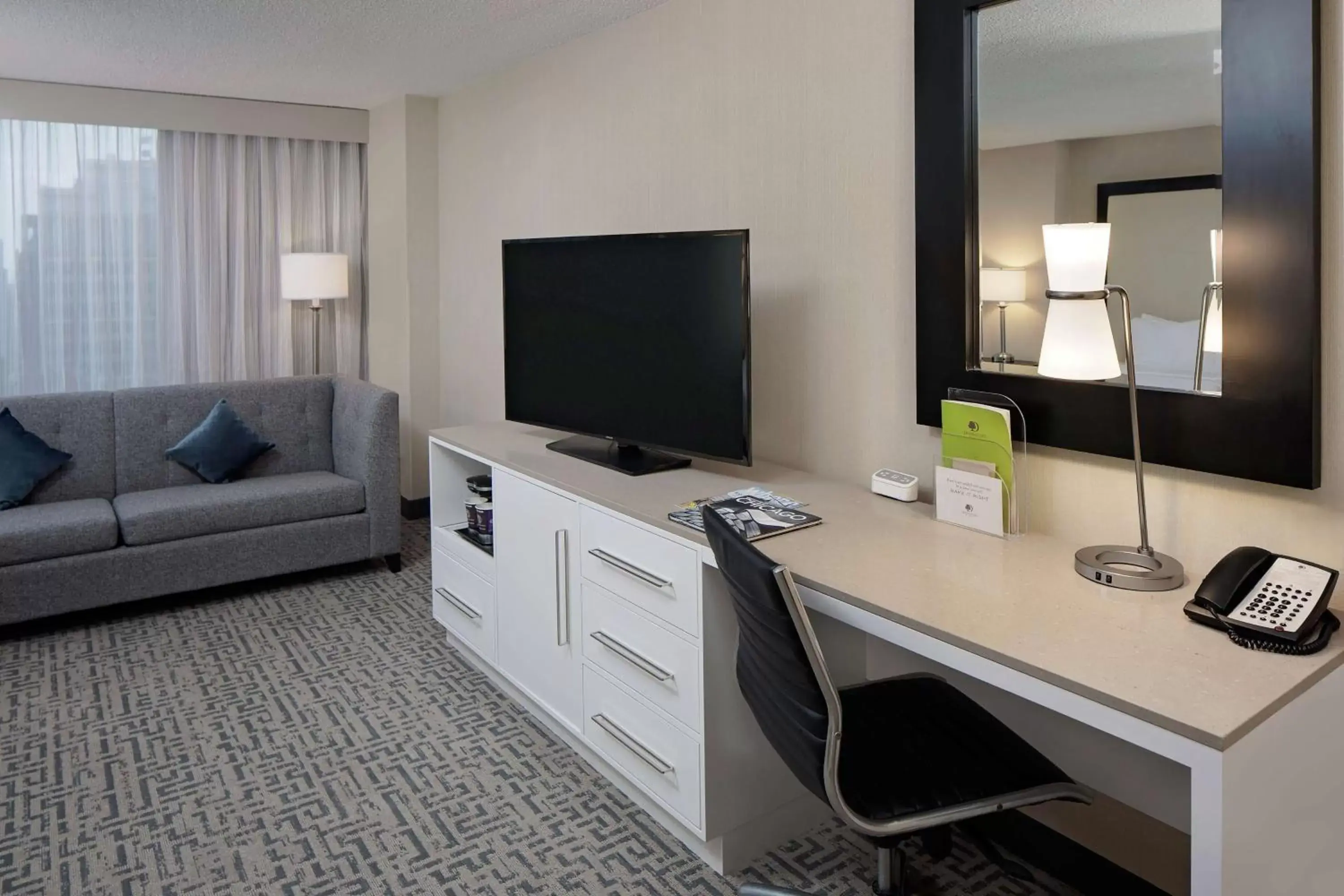 Living room, TV/Entertainment Center in DoubleTree by Hilton Chicago Magnificent Mile