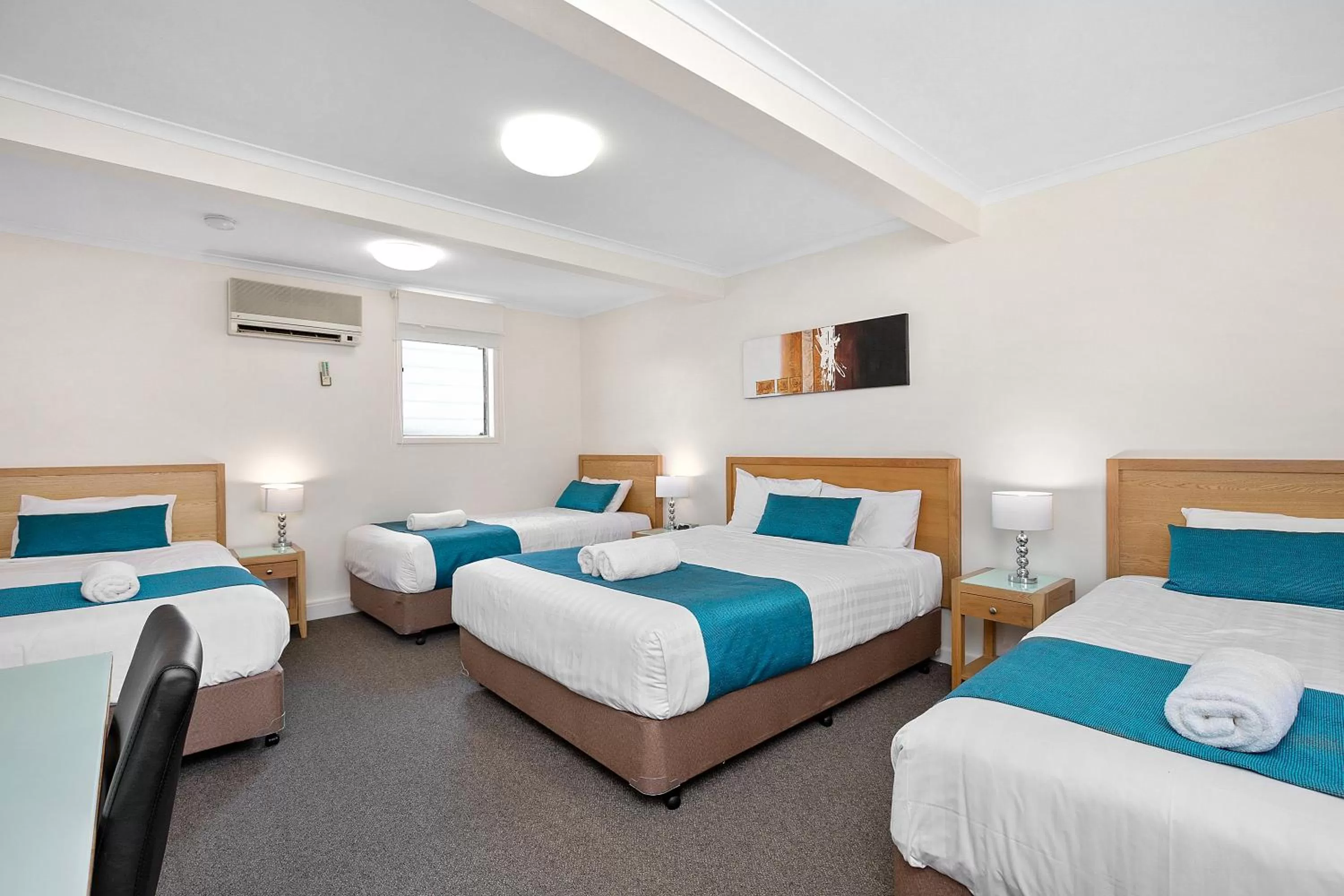 Bed in Thunderbird Motel Yass