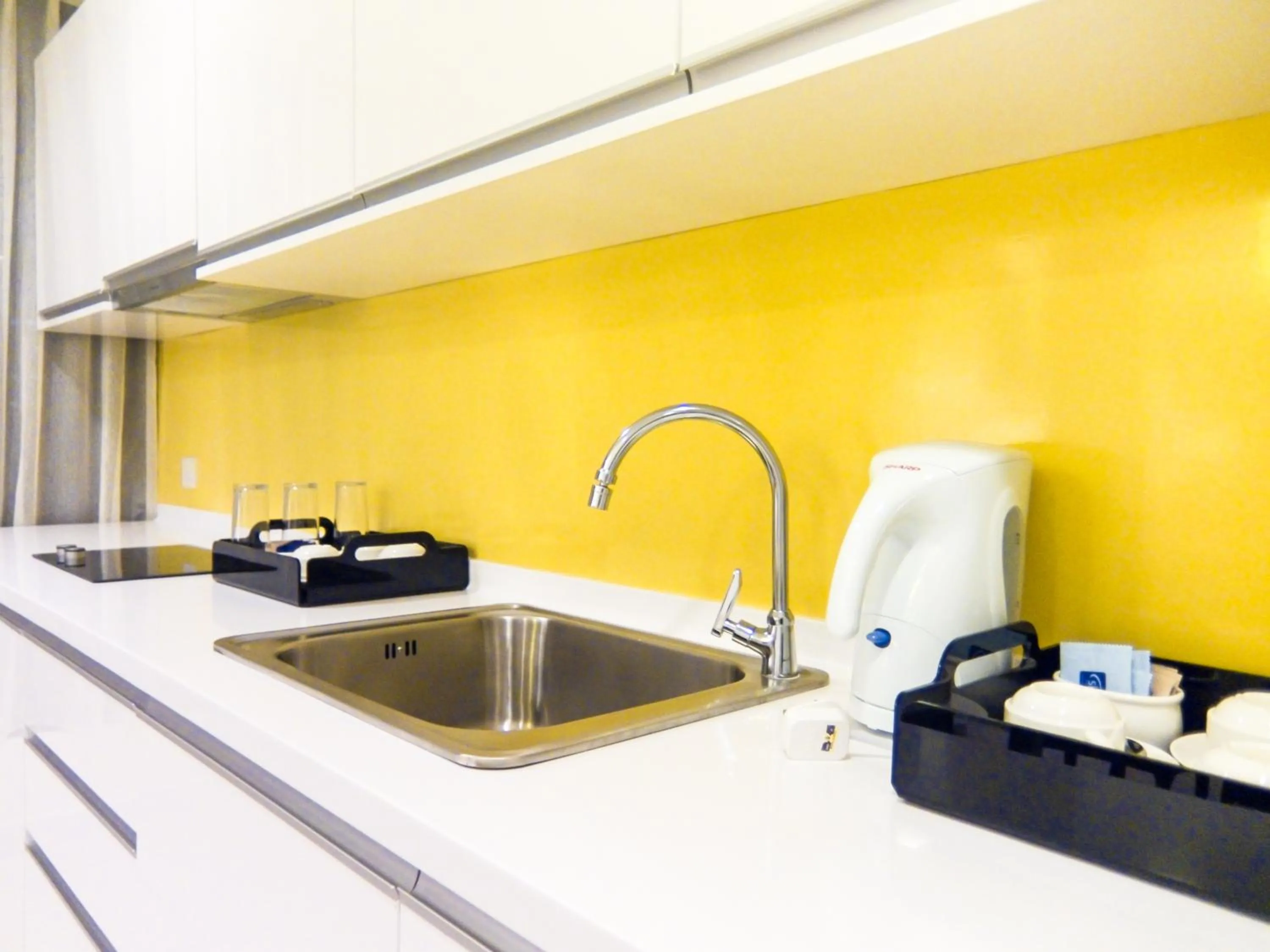 Kitchen or kitchenette in Sky Hotel