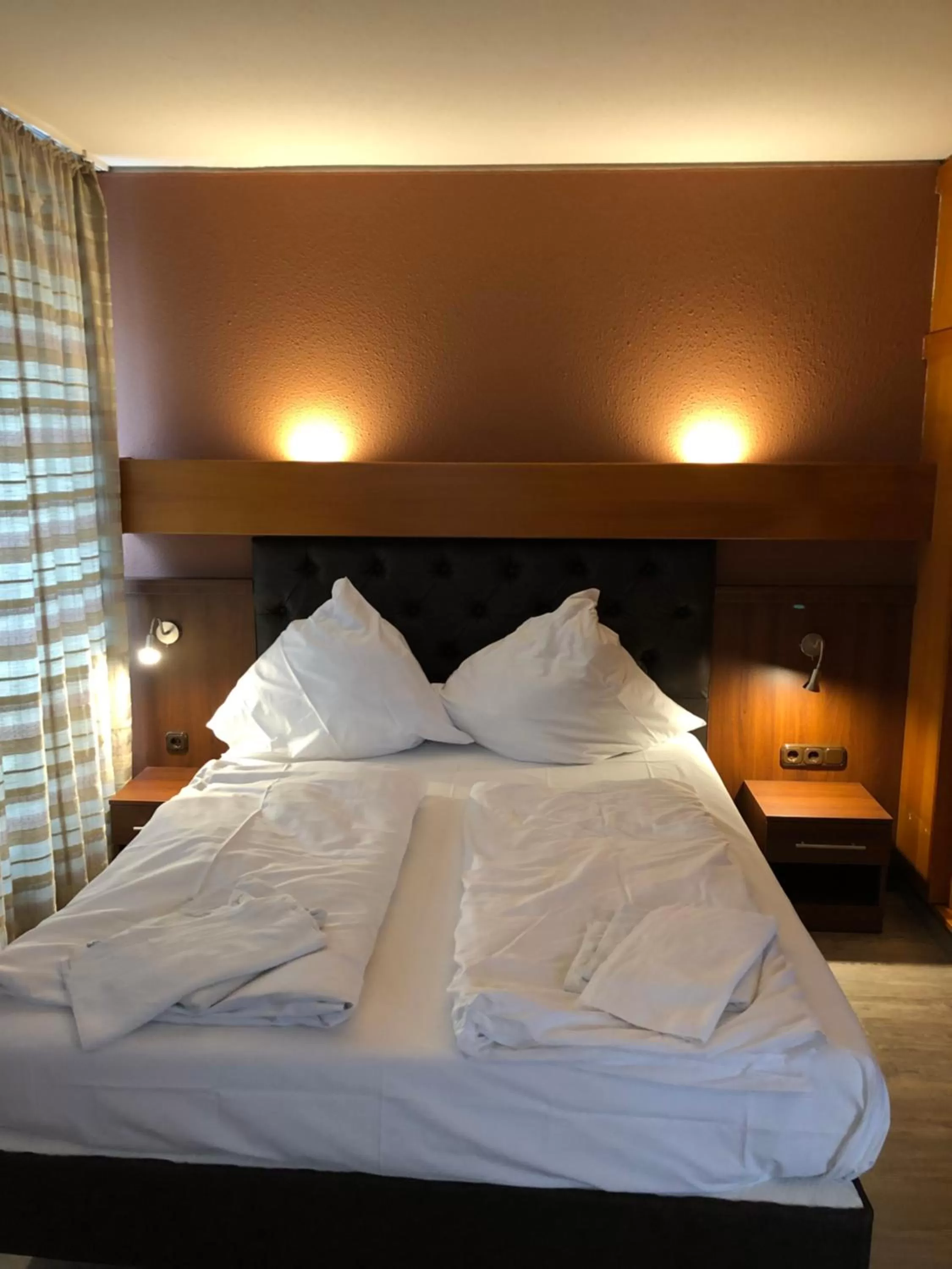 Bed in Hotel Poseidon