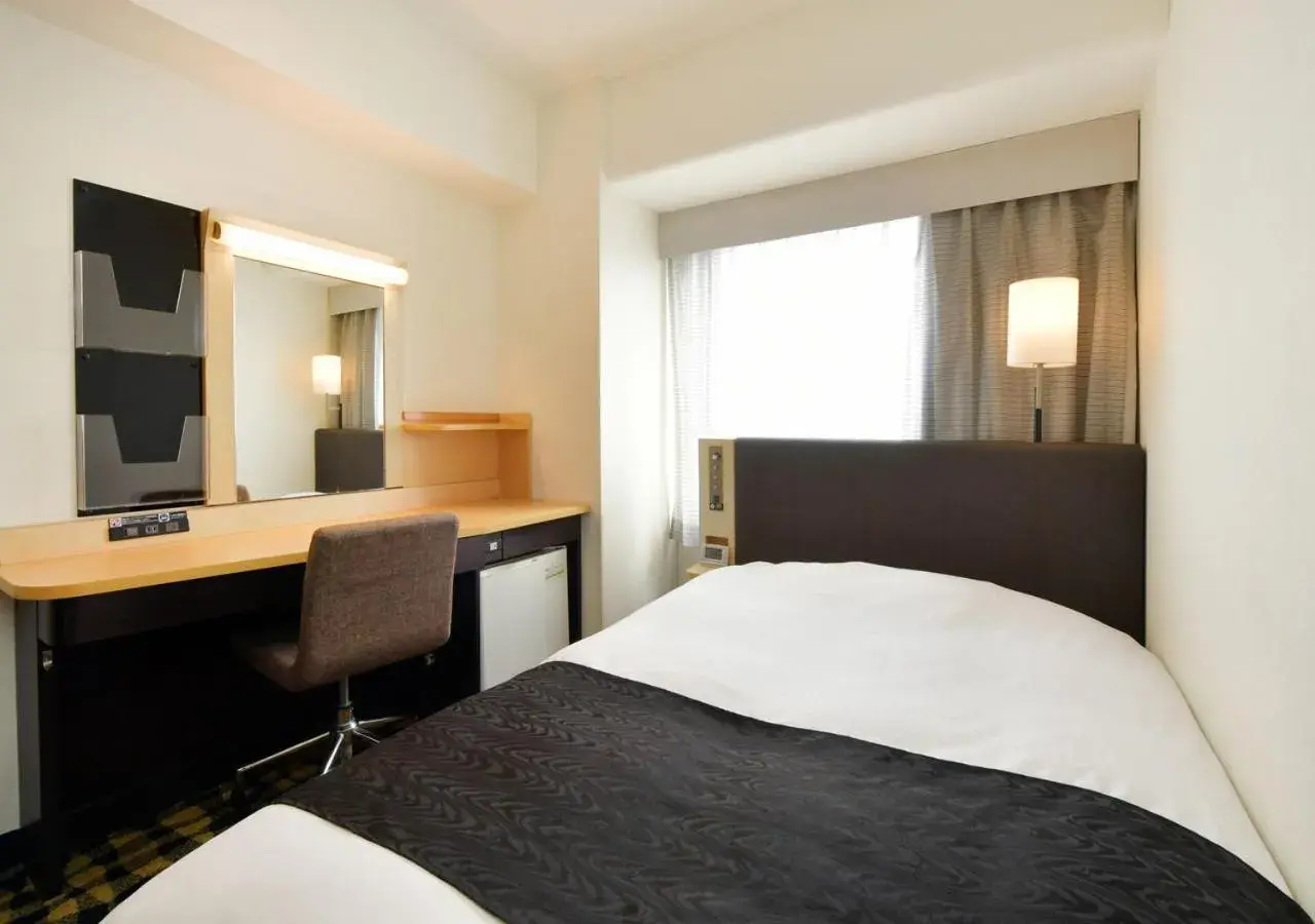 Photo of the whole room, Bed in APA Hotel Nagoya Sakae