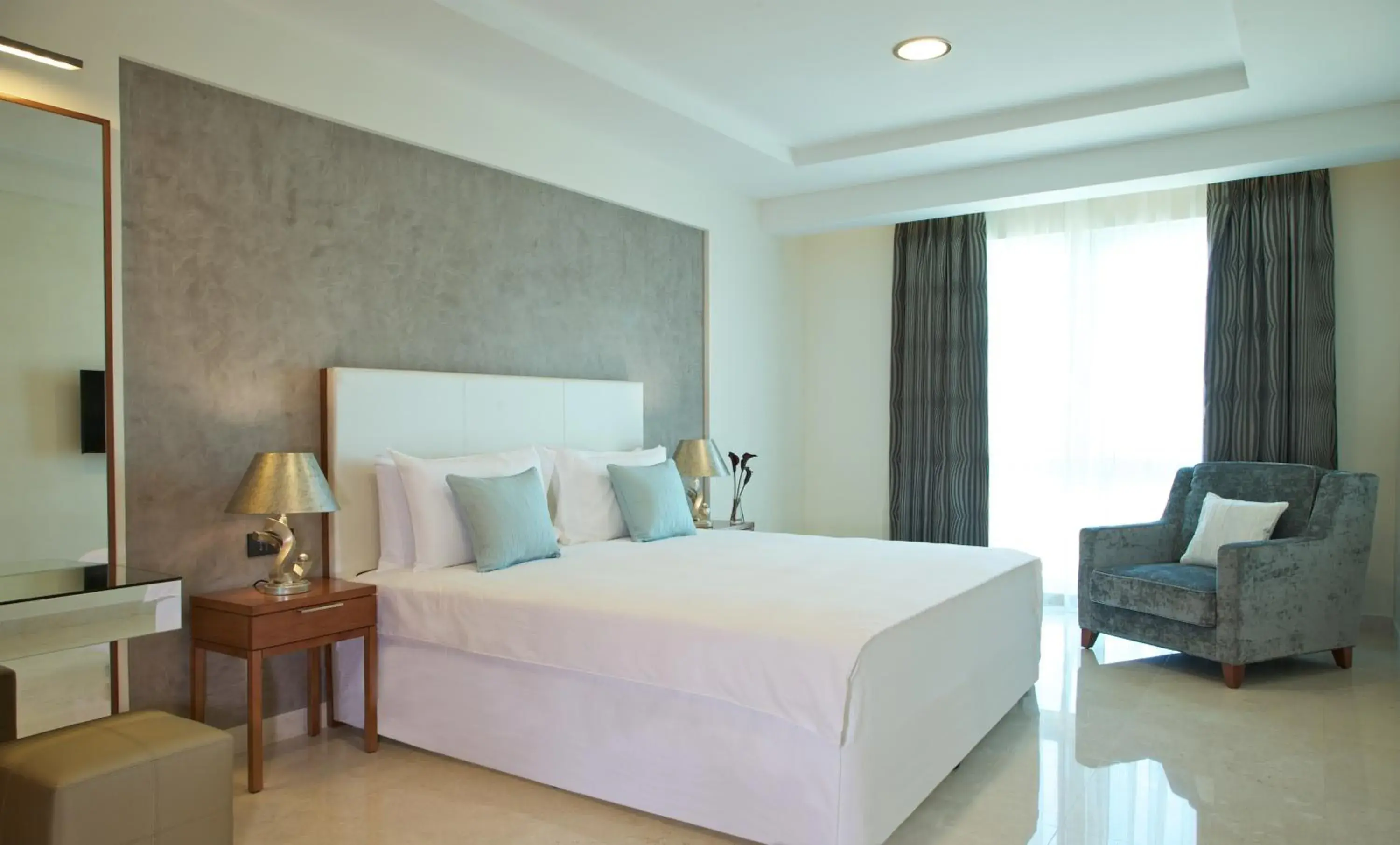 Bedroom, Bed in Millennium Executive Apartments Muscat
