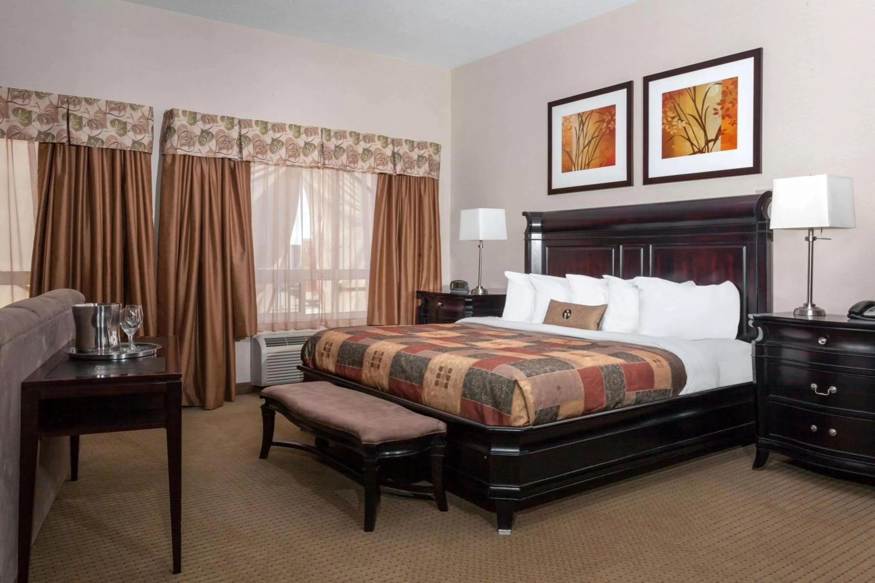 Photo of the whole room, Bed in Ramada by Wyndham Weyburn
