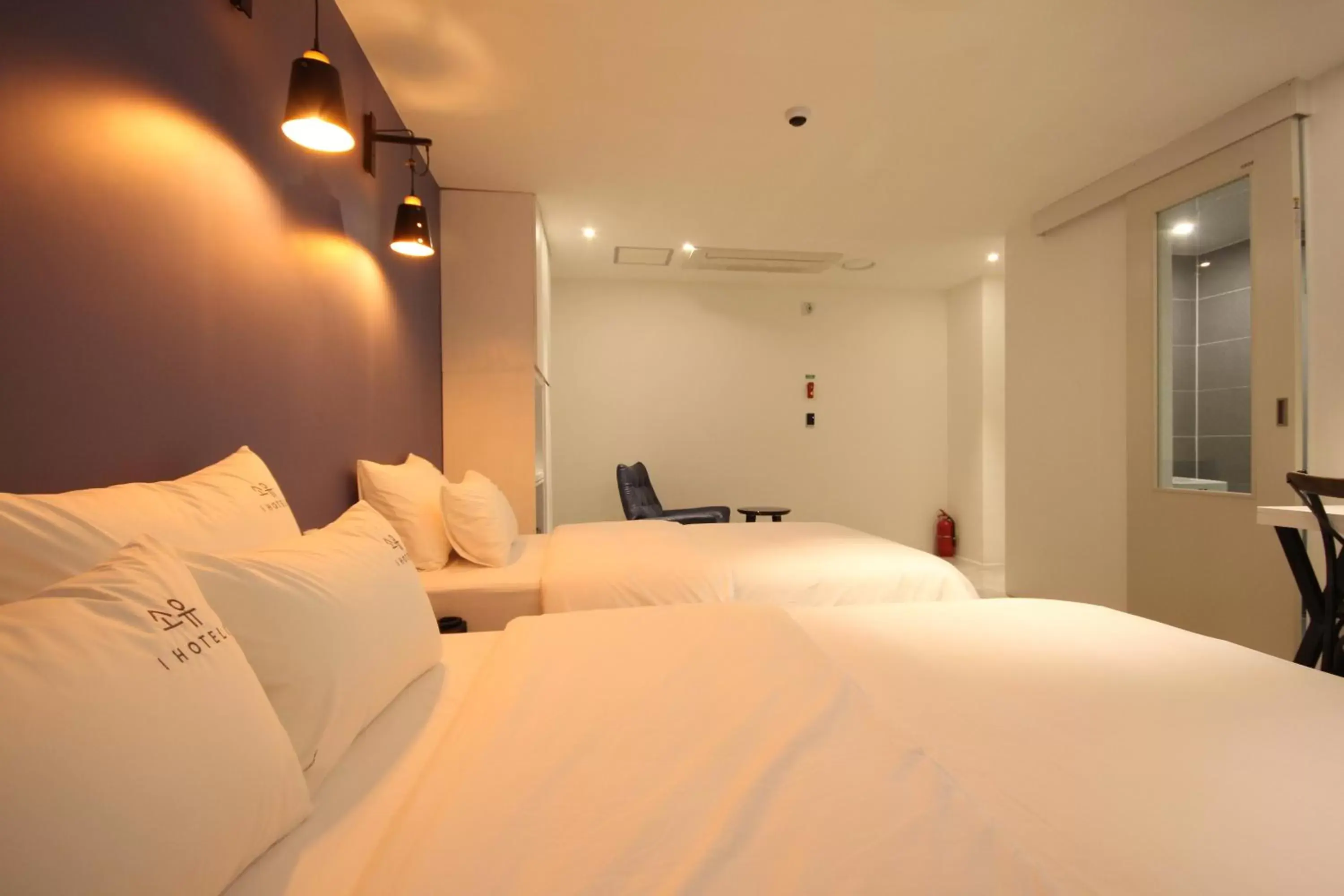 Bed in SOYU Hotel