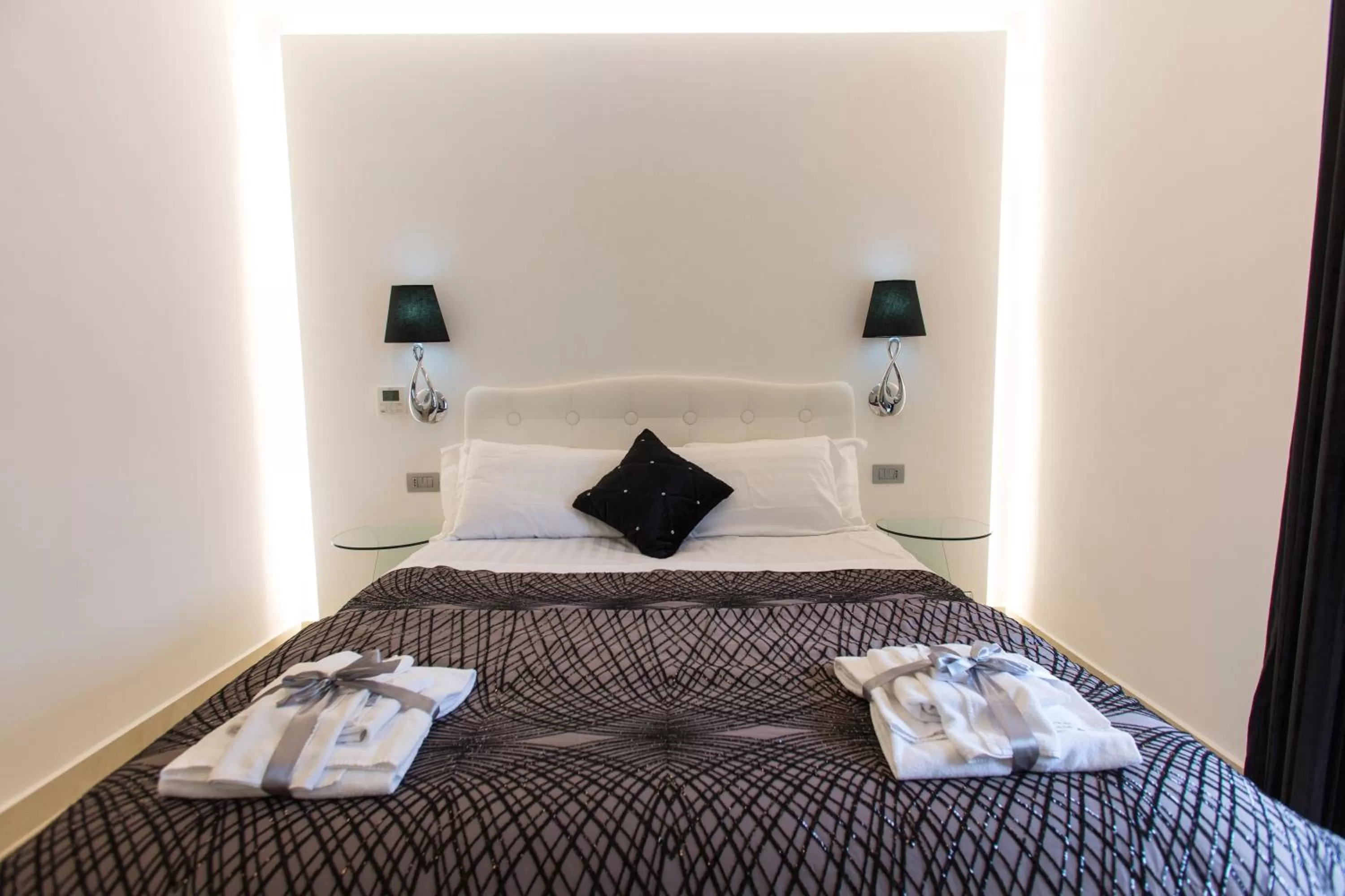 Bed in San Pietro Grand Suite