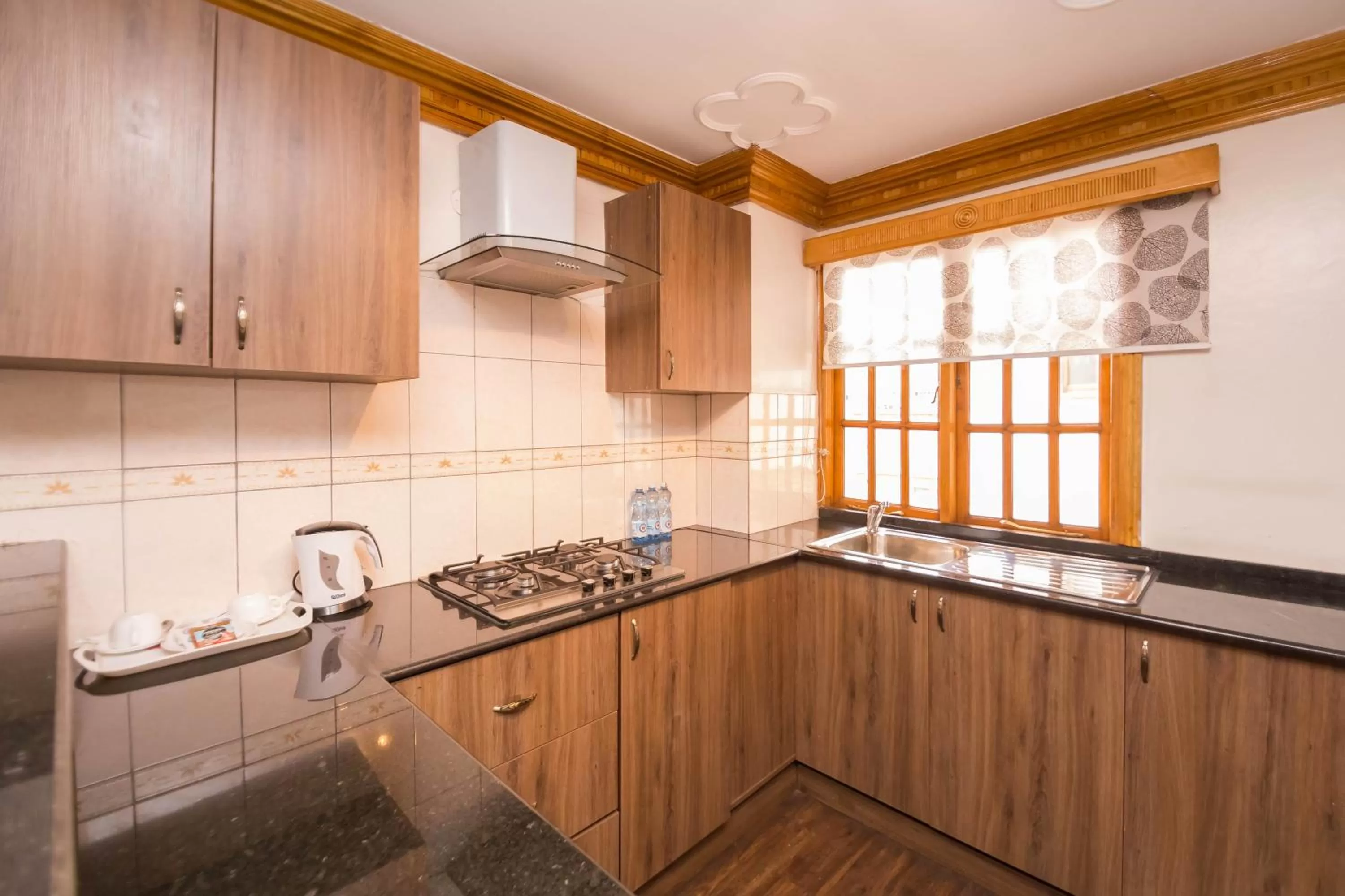 Kitchen or kitchenette in Marble Arch Hotel