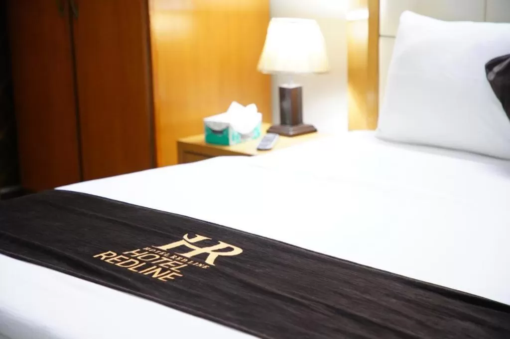 Bed in Hotel Red Line