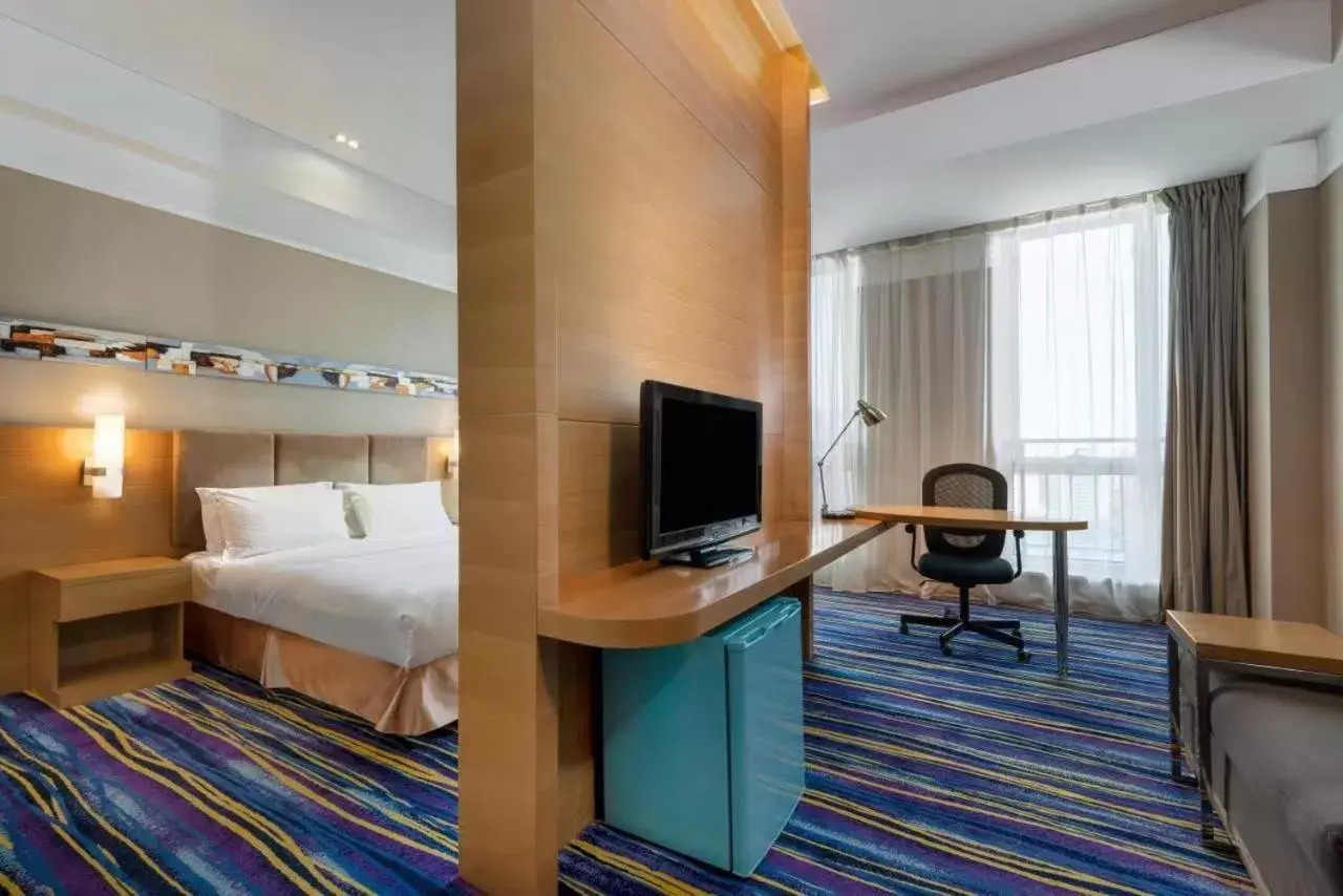 Bed in Holiday Inn Express Tianjin Heping, an IHG Hotel
