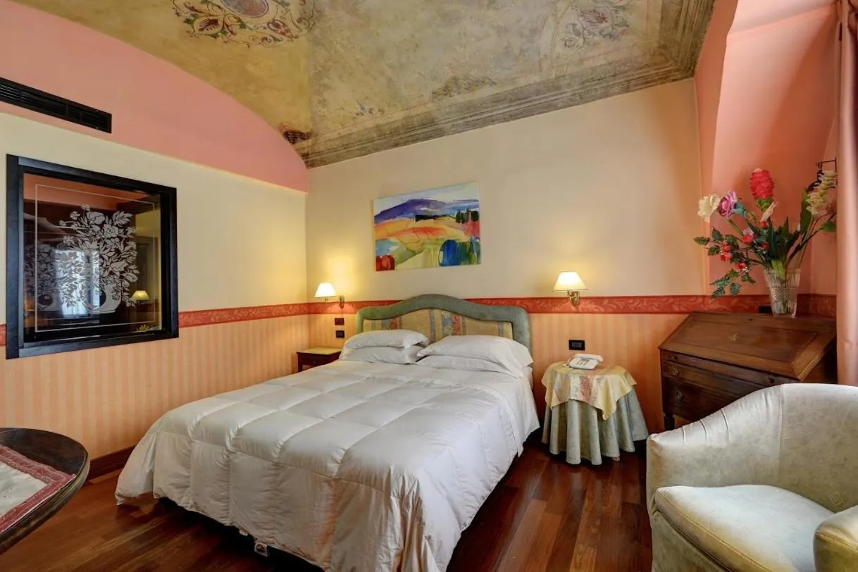 Bed in Hotel Due Mondi