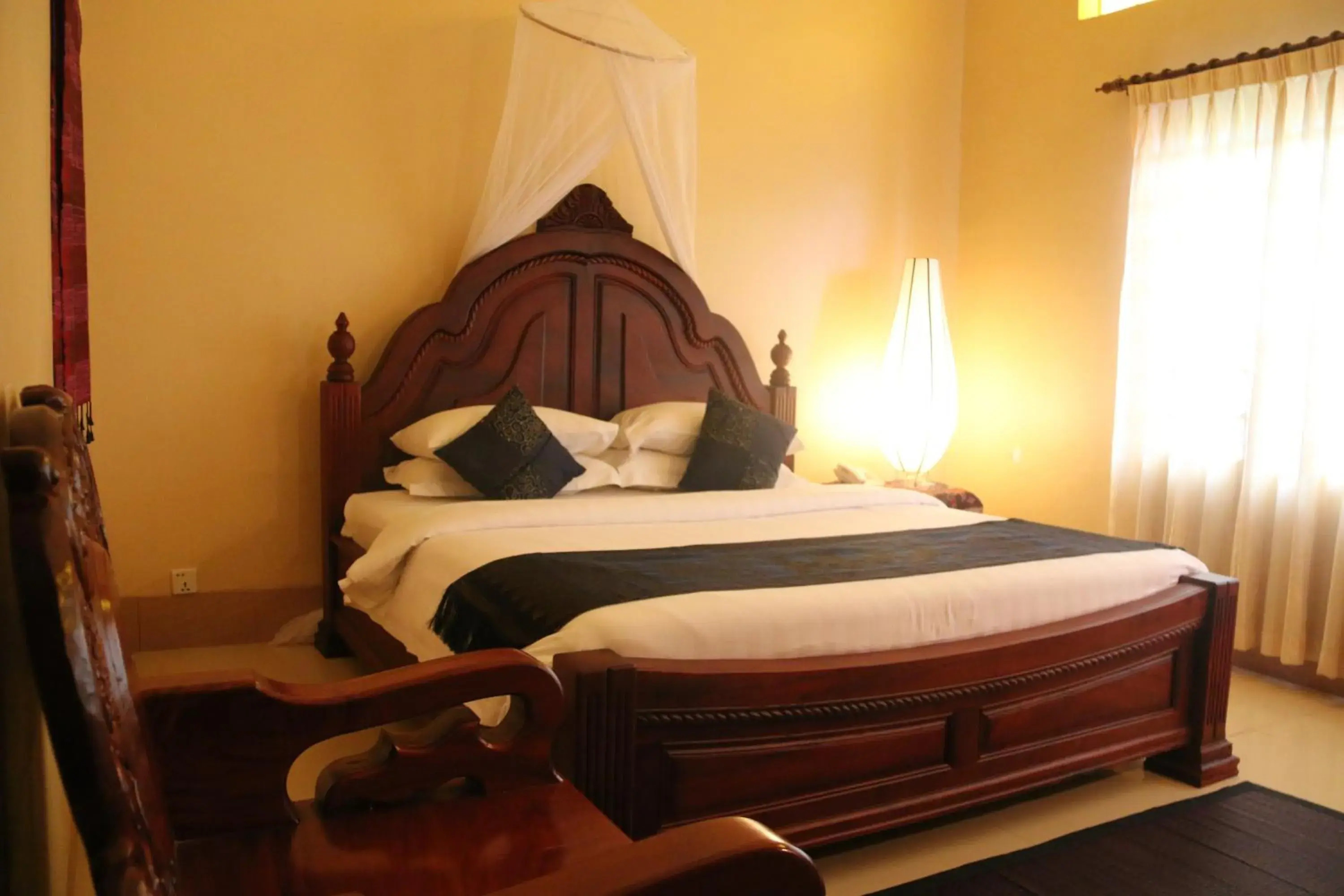 Bed in Shining Angkor Boutique Hotel