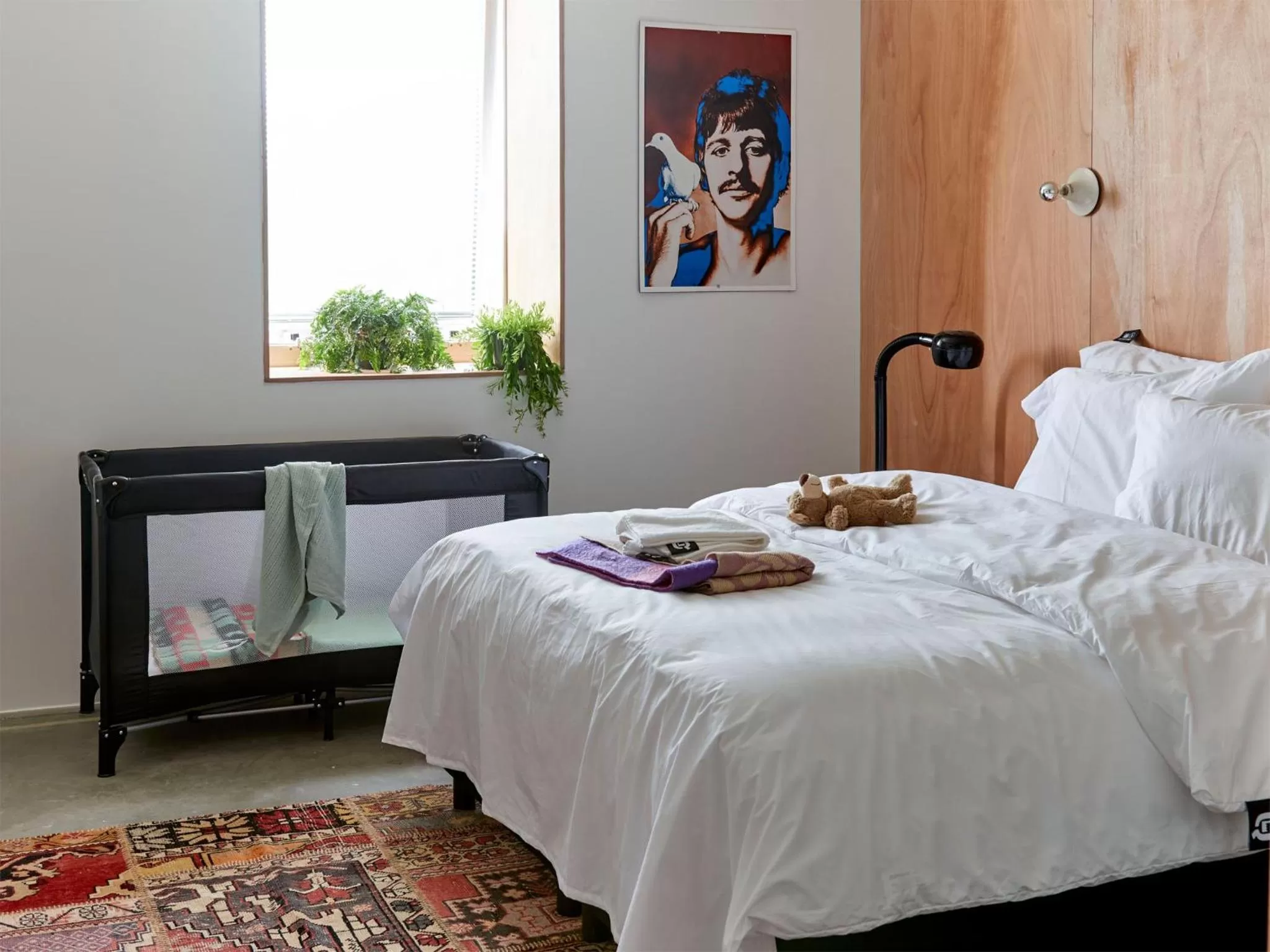 Bed in Q-Factory Hotel