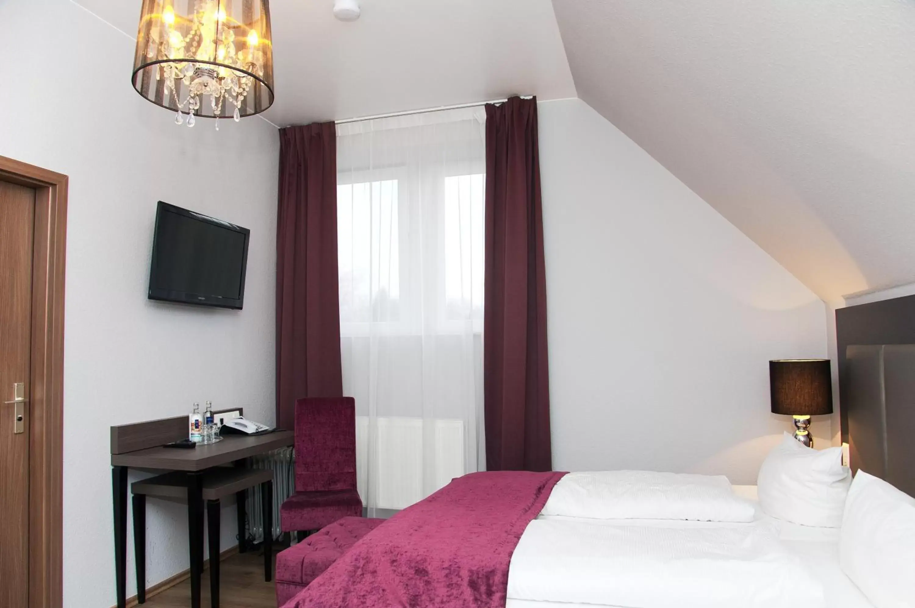 Photo of the whole room, Bed in Arena Villa am Wasserpark Photo of the whole room, Bed in Arena Villa am Wasserpark