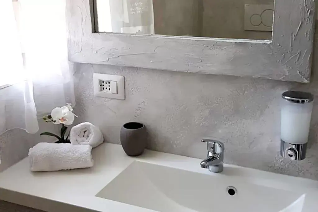 Bathroom in ILLUVIA affitto camere