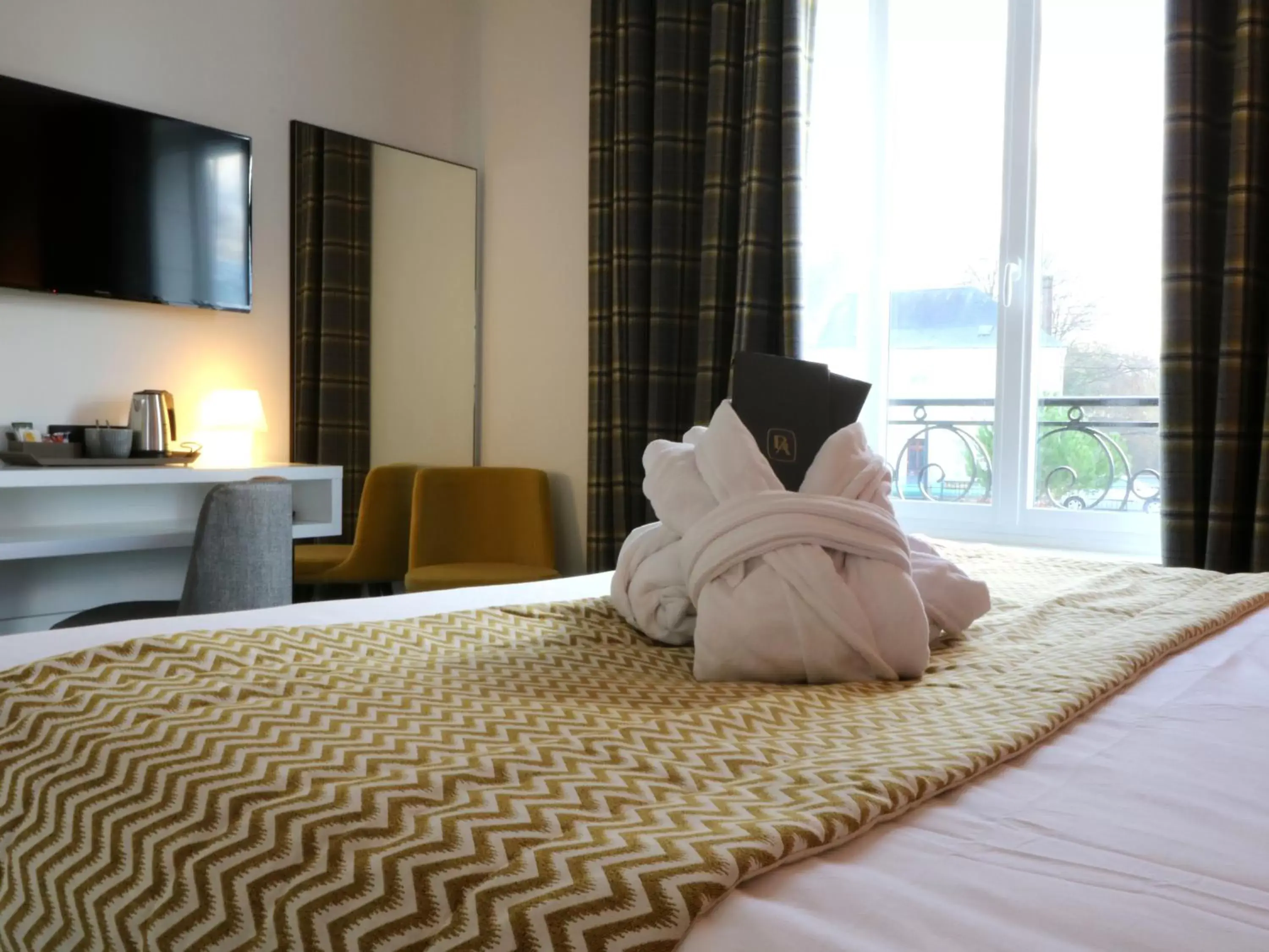 Bedroom, Bed in Hôtel-Restaurant Bel Ami Bedroom, Bed in Hôtel-Restaurant Bel Ami