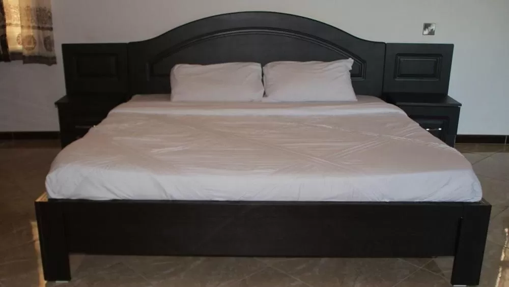 Bed in Acactus Hotel
