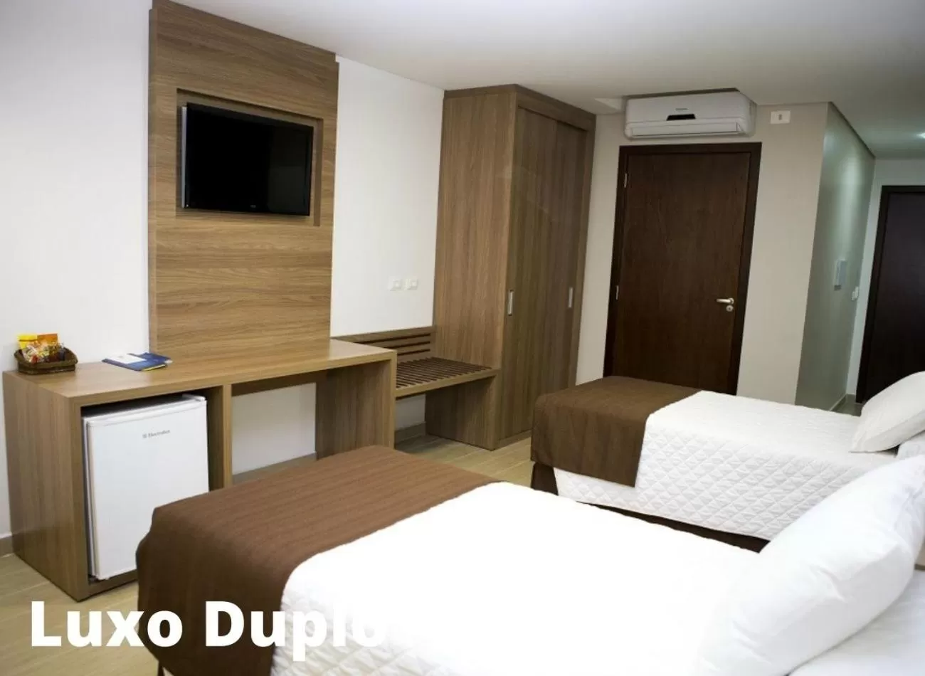 Bed in Foz Presidente Comfort Hotel