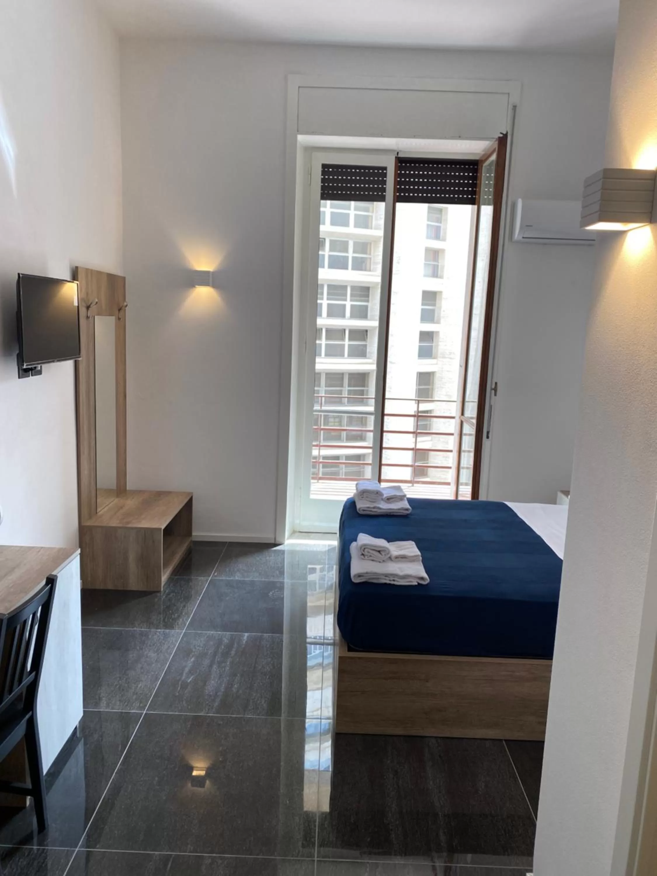 Photo of the whole room, Bed in Hall inn B&B in Chiostro