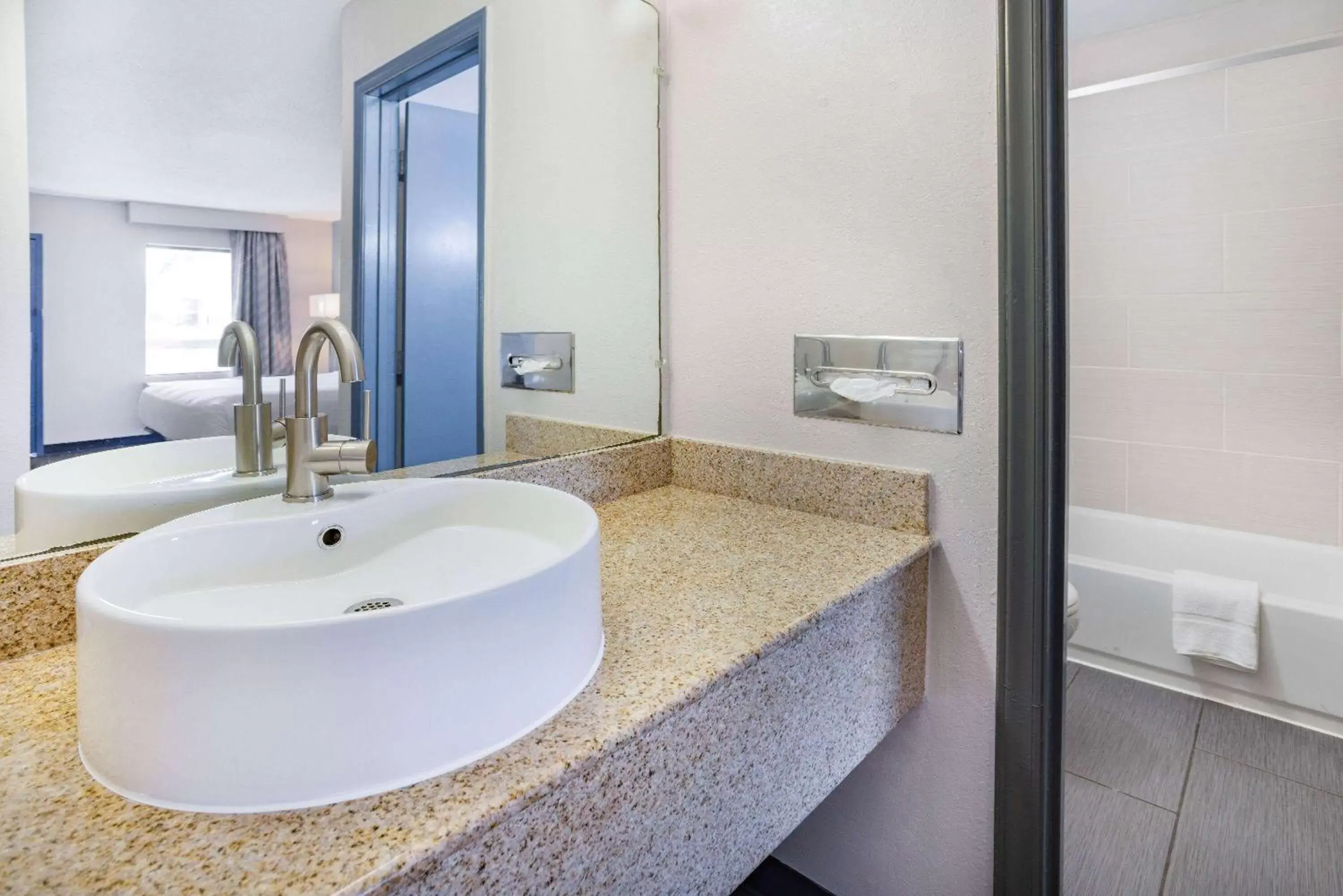 TV and multimedia, Bathroom in Days Inn by Wyndham Raleigh Glenwood-Crabtree