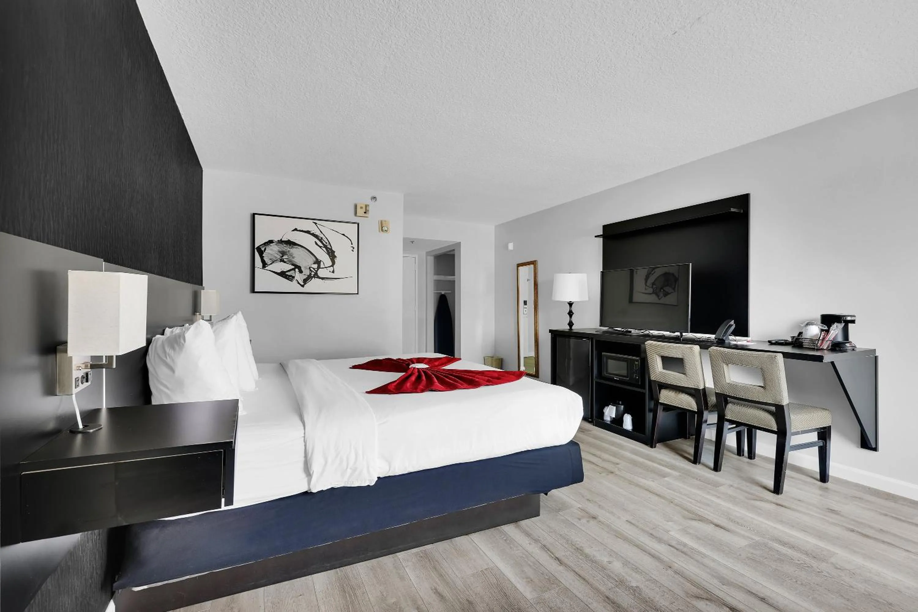 Bed in Ramada by Wyndham Jacksonville I-95 by Butler Blvd