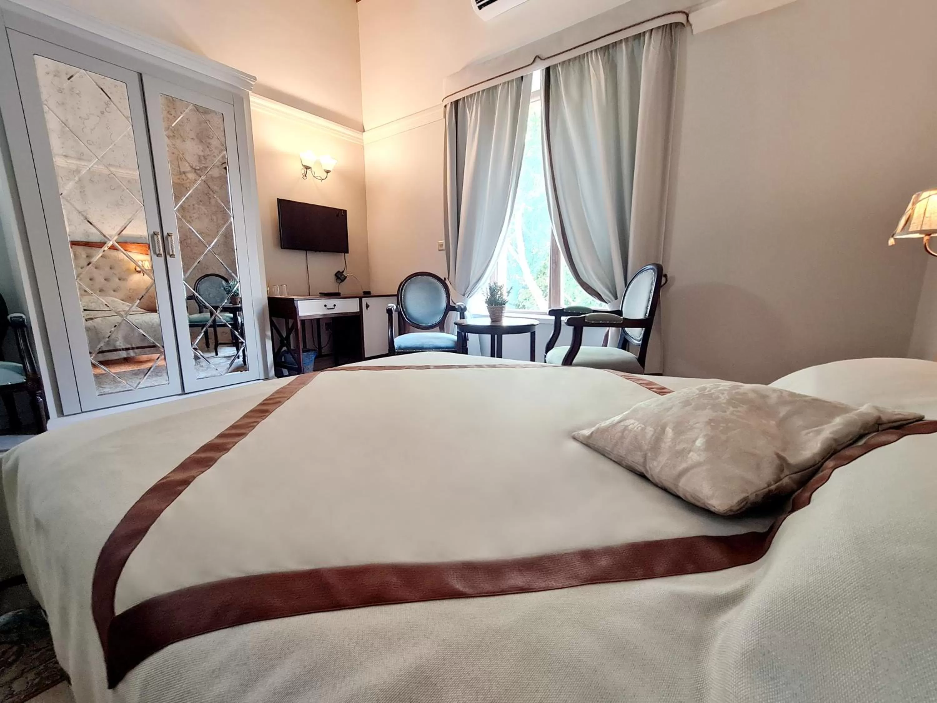 Bed in SOFIA BOUTIQUE HOTEL