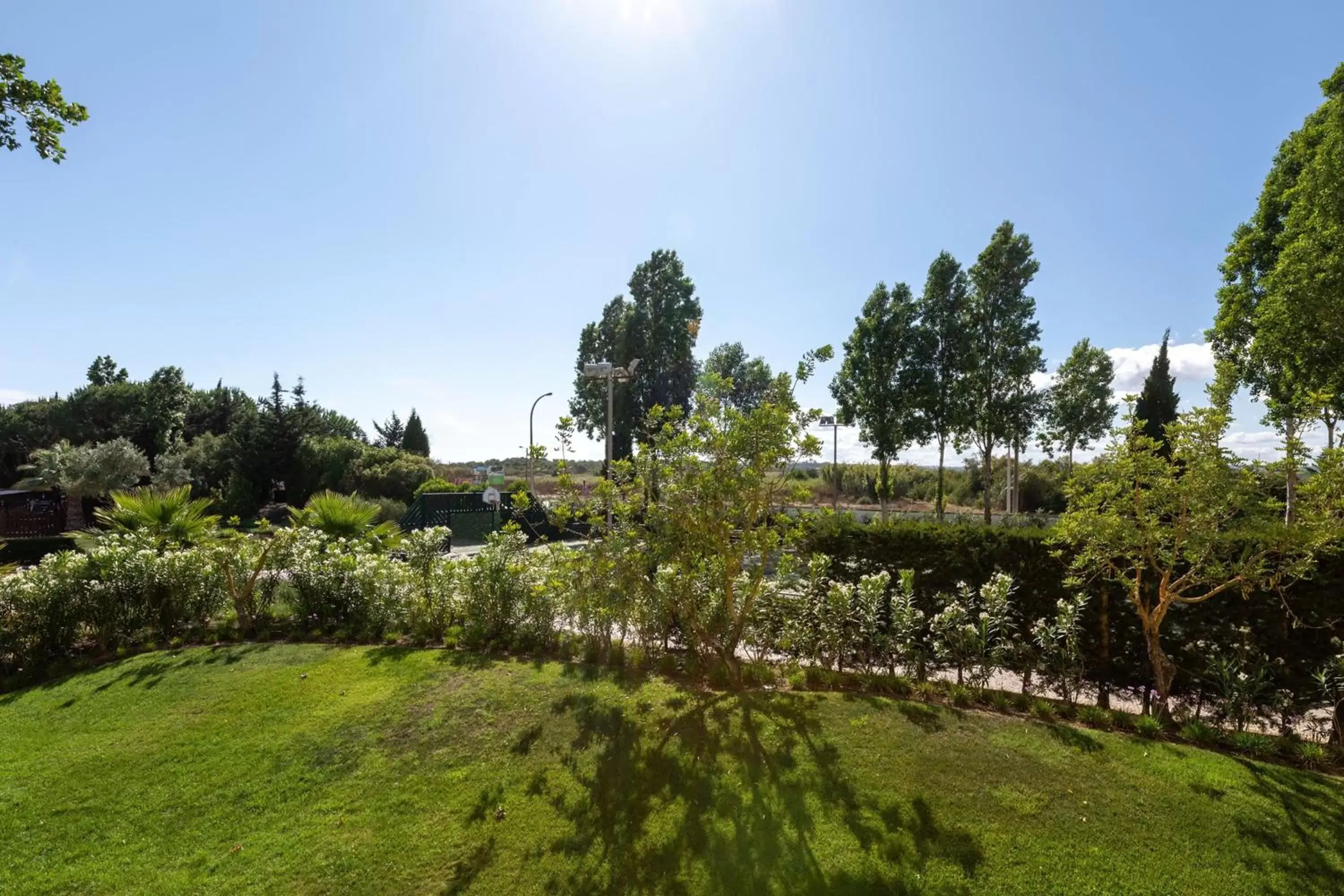 Photo of the whole room, Garden in Domes Lake Algarve, Autograph Collection