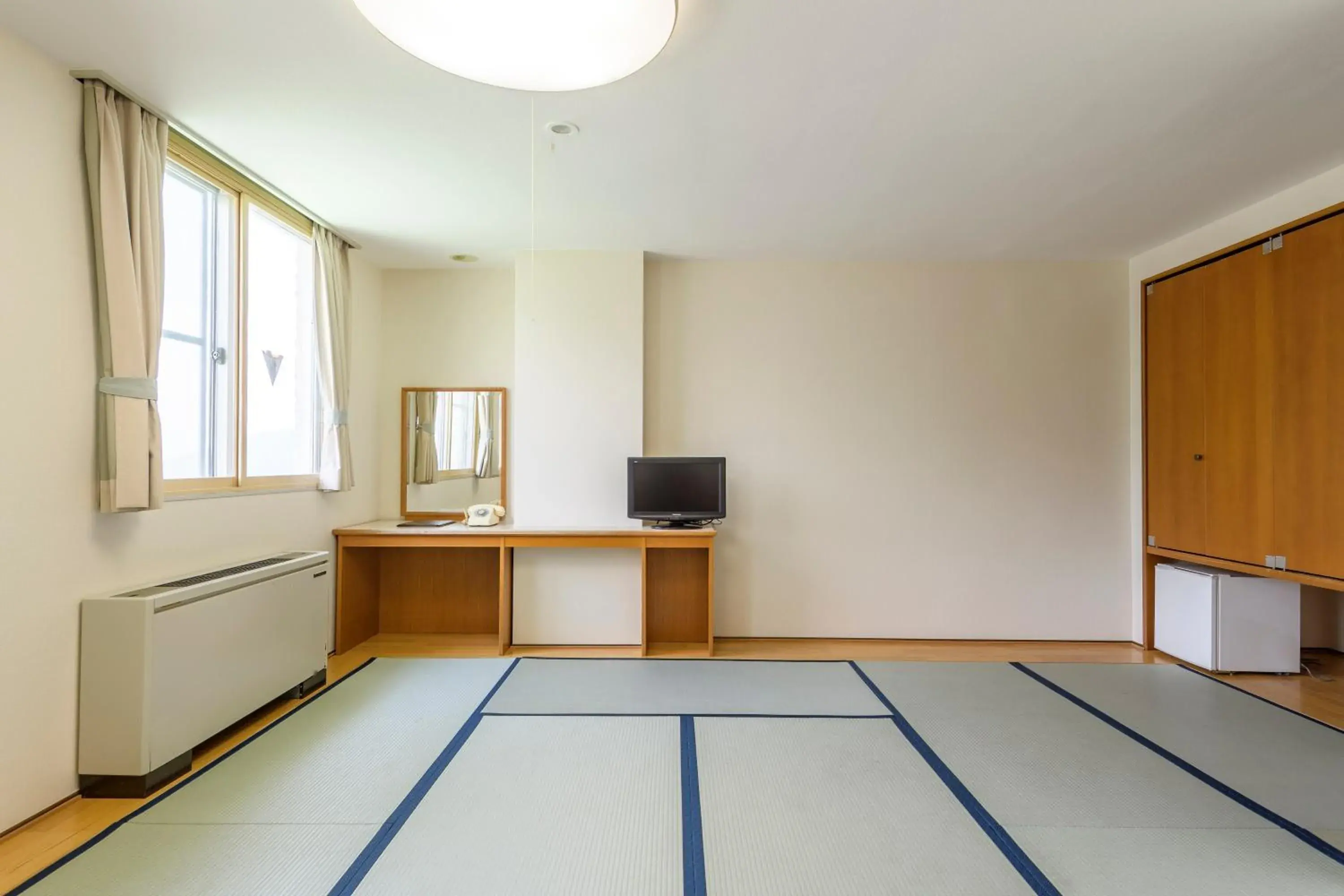 Photo of the whole room, TV/Entertainment Center in Hotel Tagawa