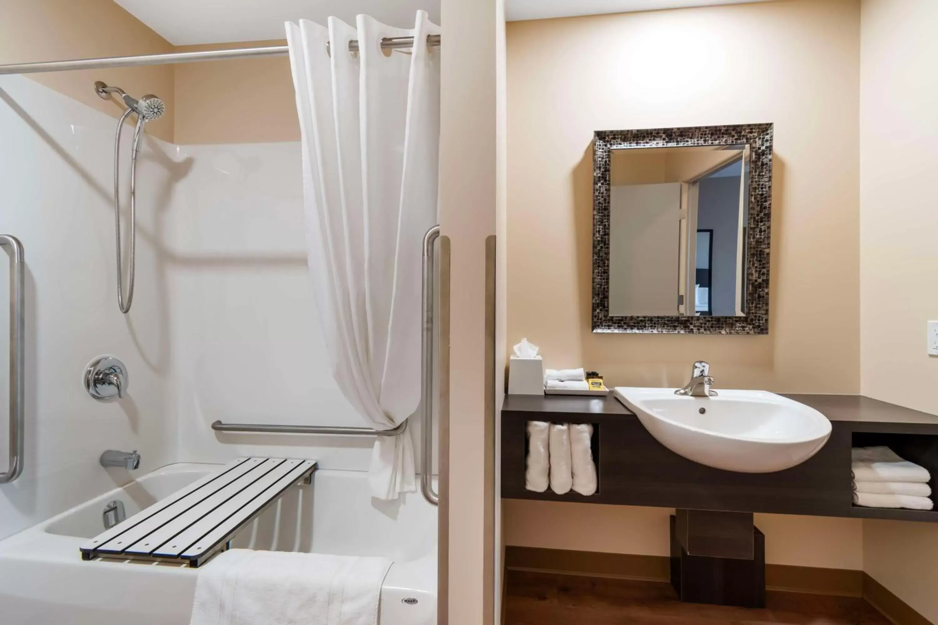 Bathroom in Villa Inn & Suites - SureStay Collection by Best Western