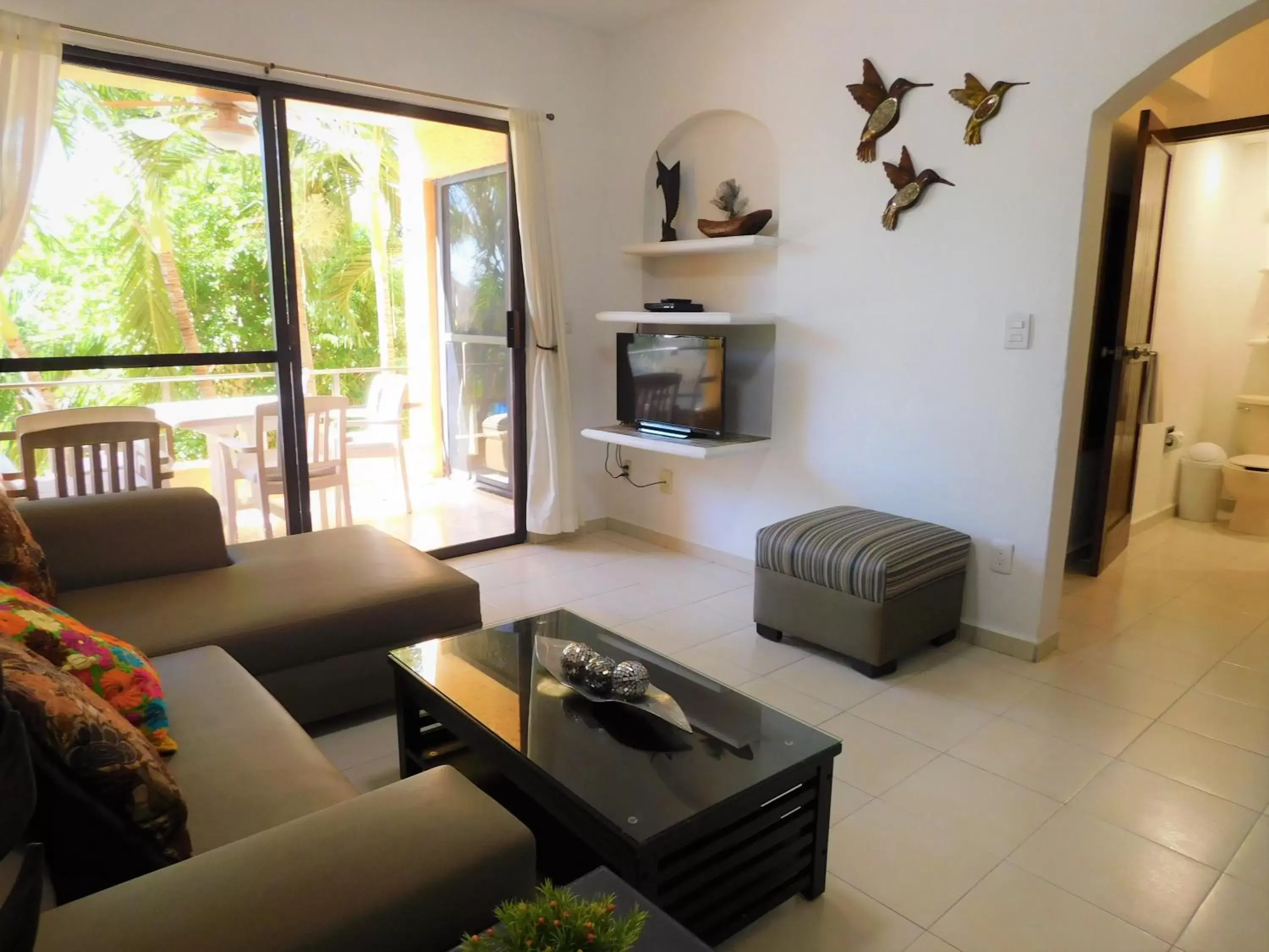 Living room, Seating Area in Nautibeach Beach Front Condos in North Beach