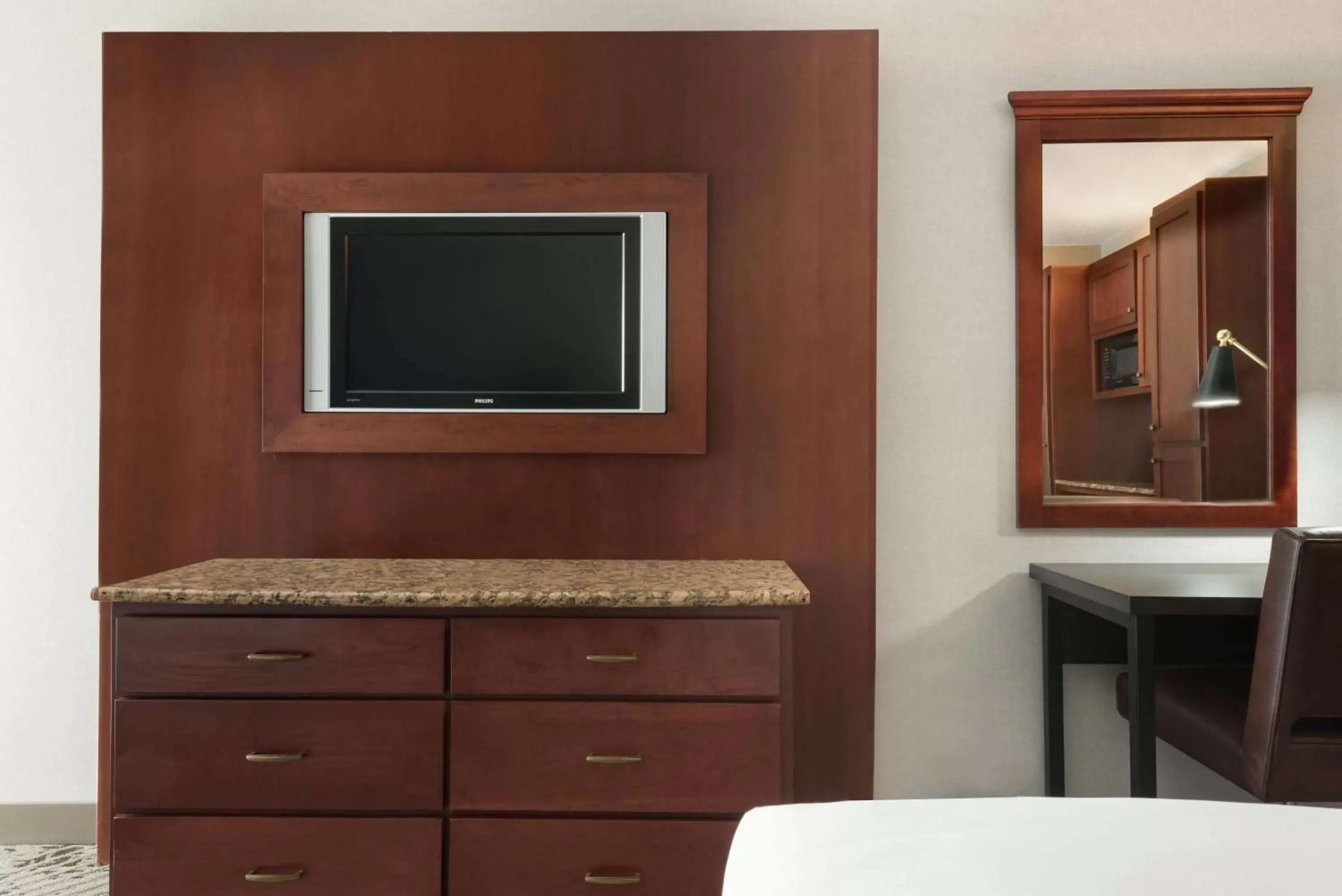 Bedroom, TV/Entertainment Center in The Clover Hotel