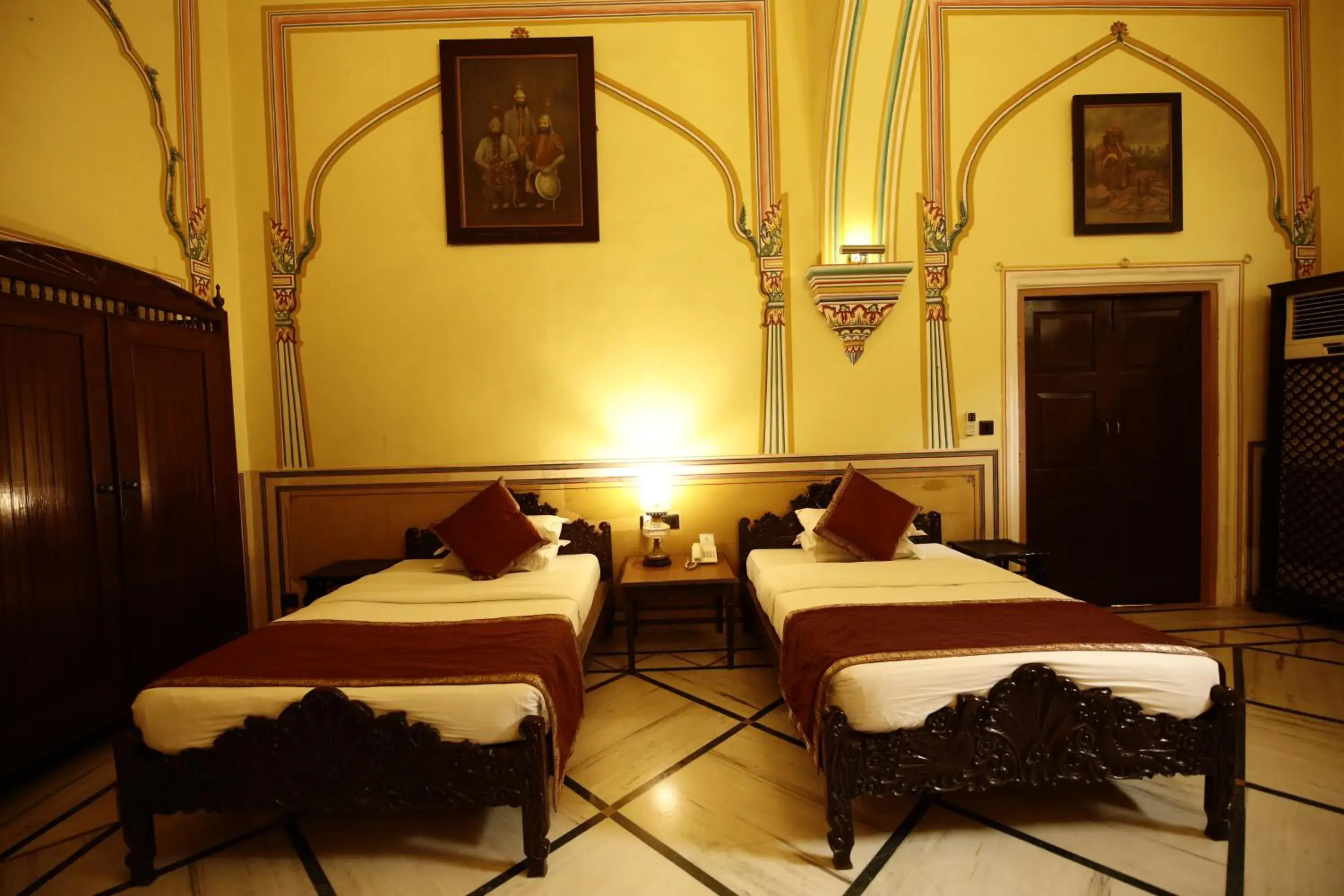 Bed in Hotel Narain Niwas Palace