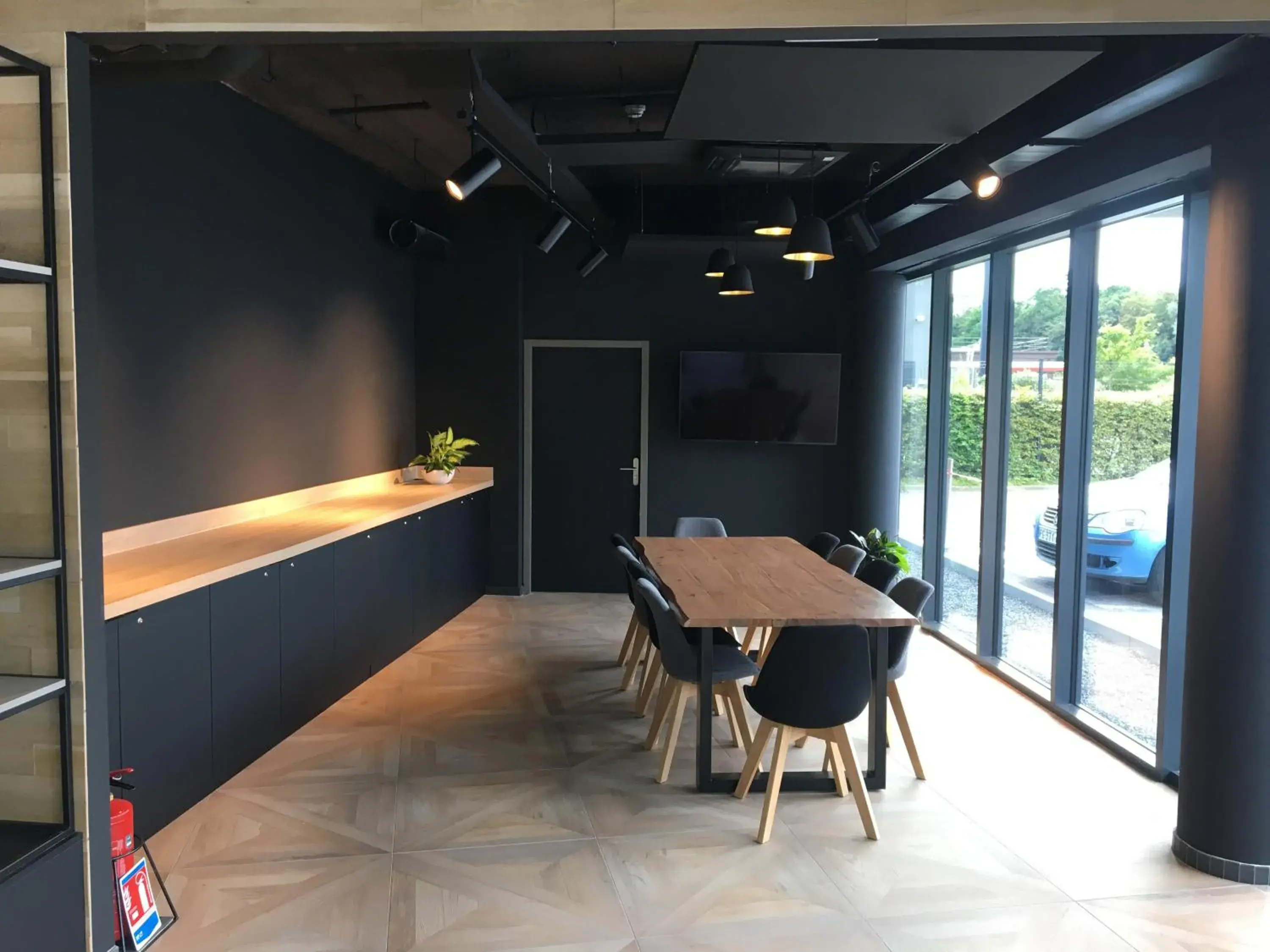 Seating area in ibis Styles Valenciennes Petite Foret