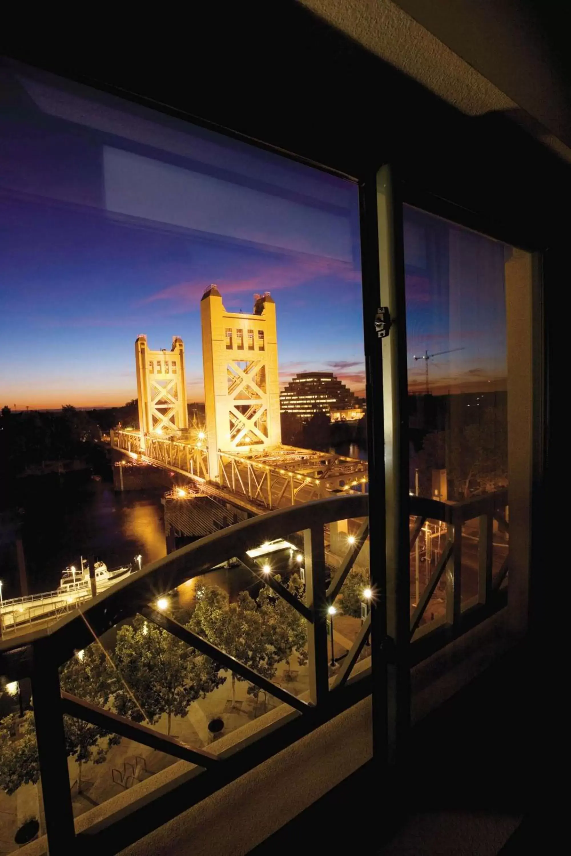 Living room, Balcony/Terrace in Embassy Suites by Hilton Sacramento Riverfront Promenade