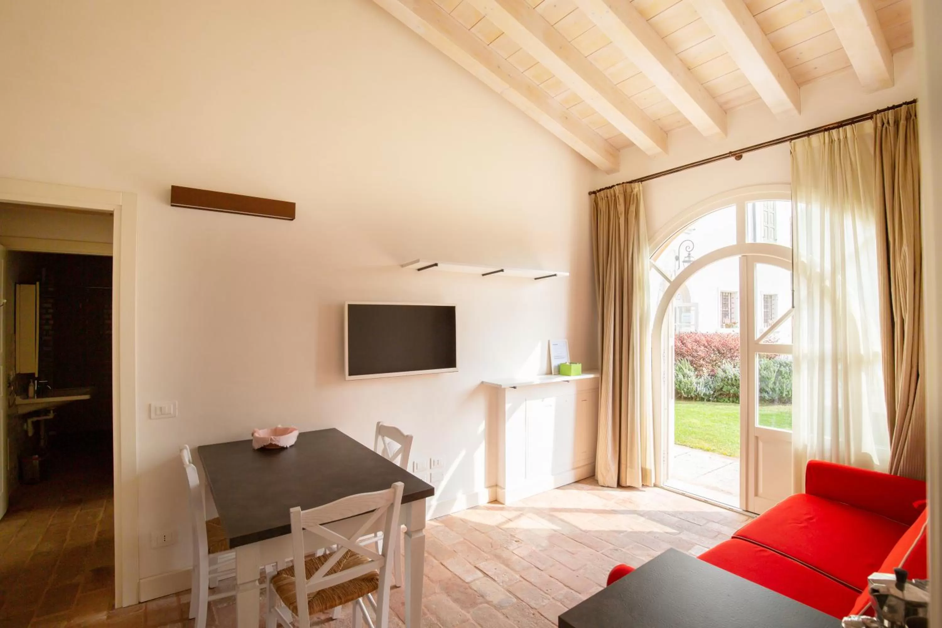 Living room in Residence Corte San Carlo