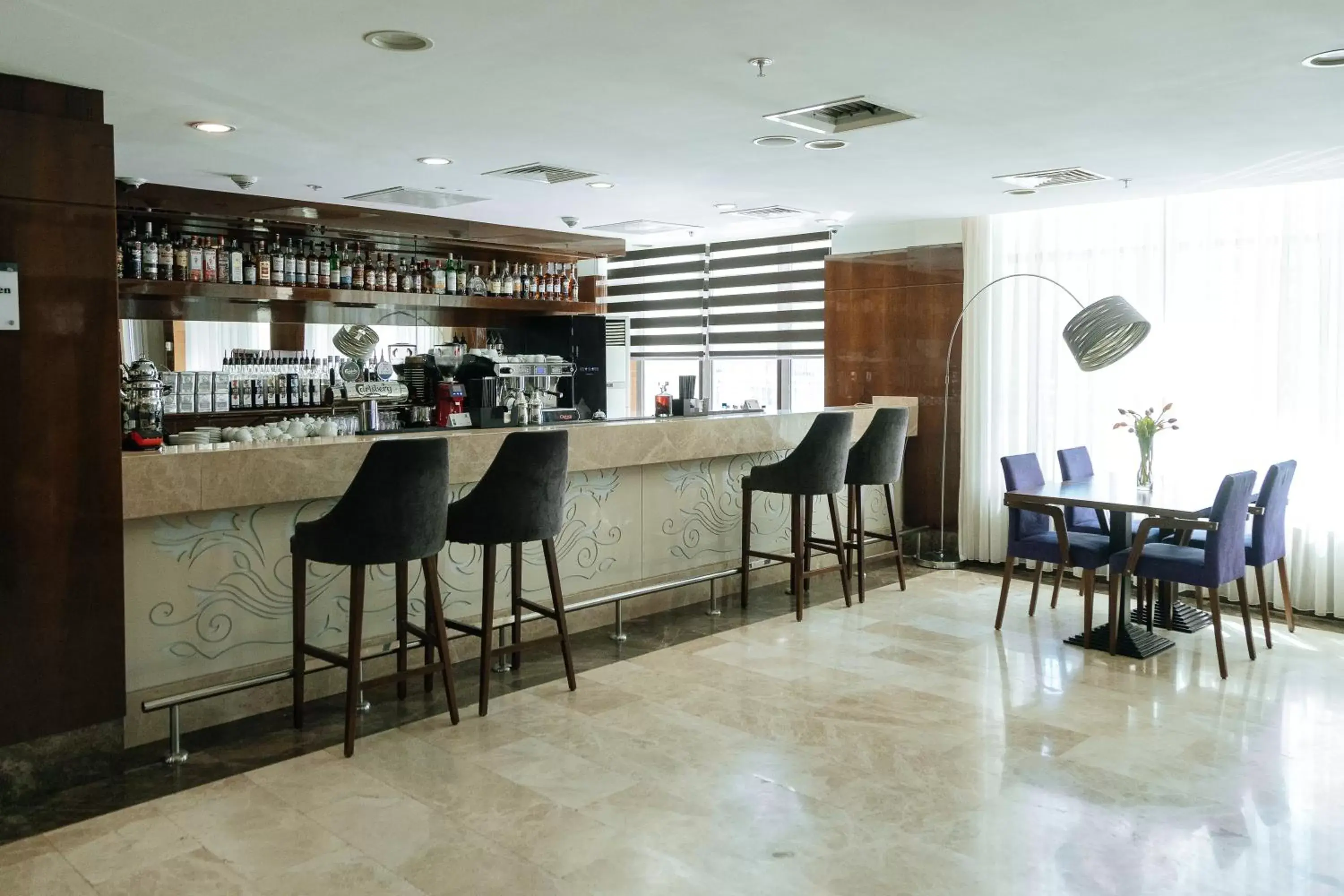 Lobby or reception, Lounge/Bar in Holiday Inn Aktau, an IHG Hotel