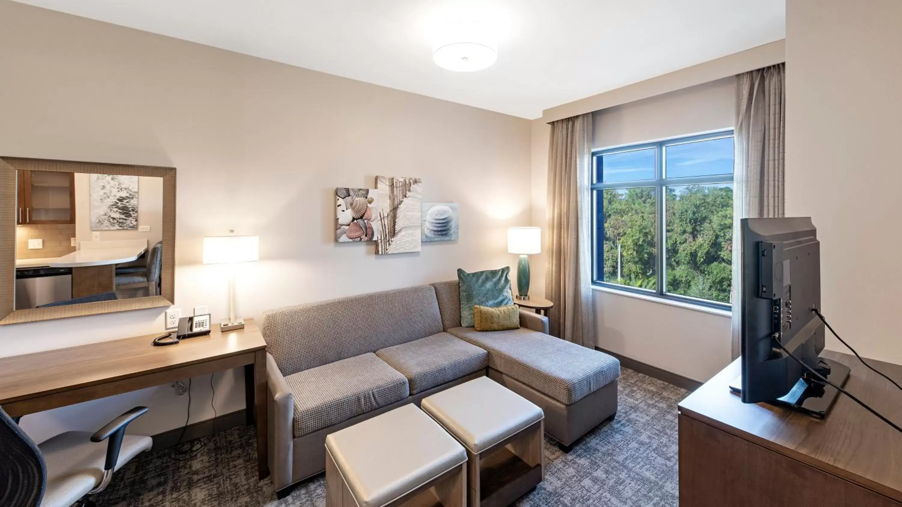 Bedroom, Seating Area in Staybridge Suites - Naples - Marco Island, an IHG Hotel