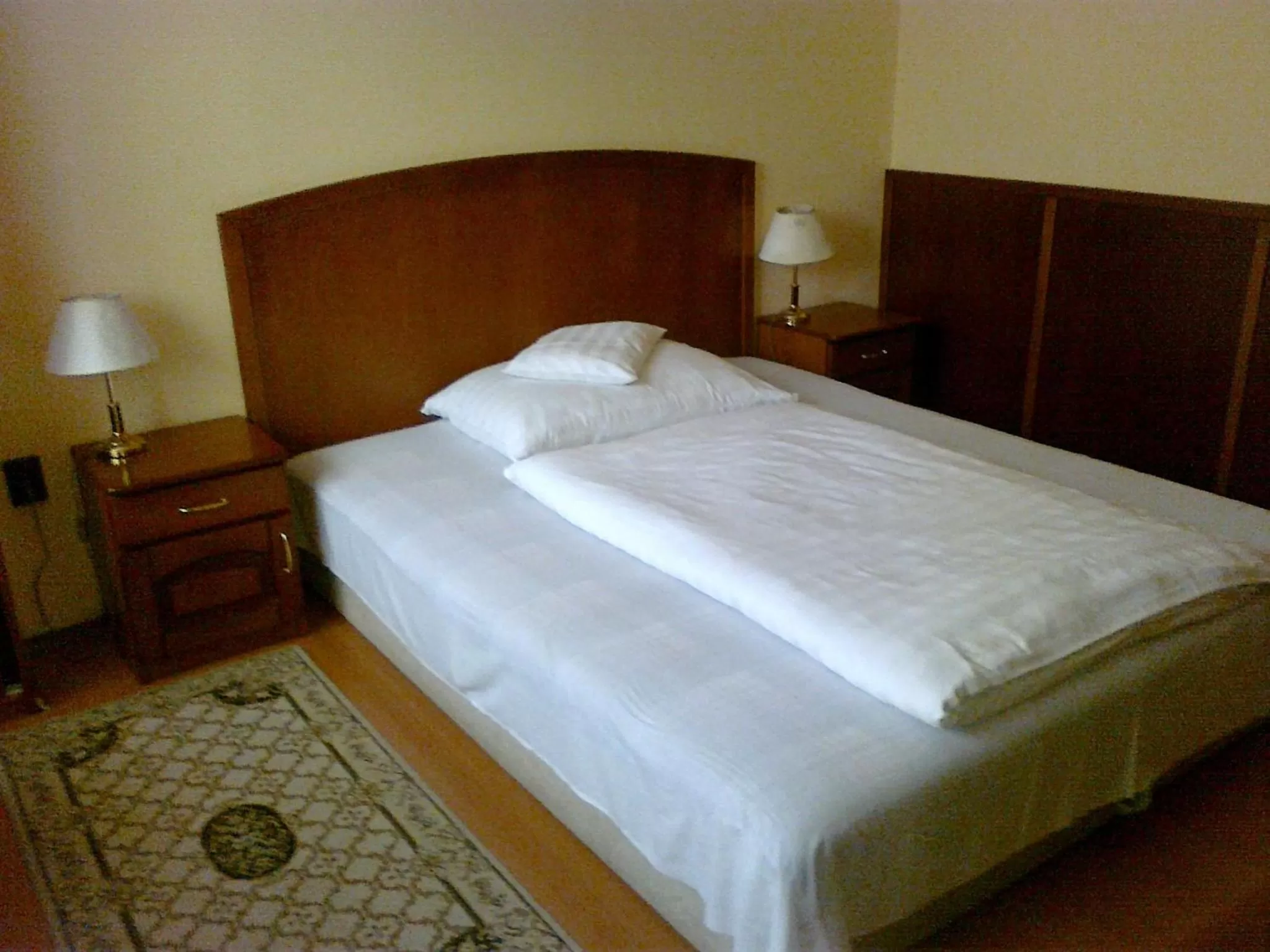 Bed in Szieszta Panzió