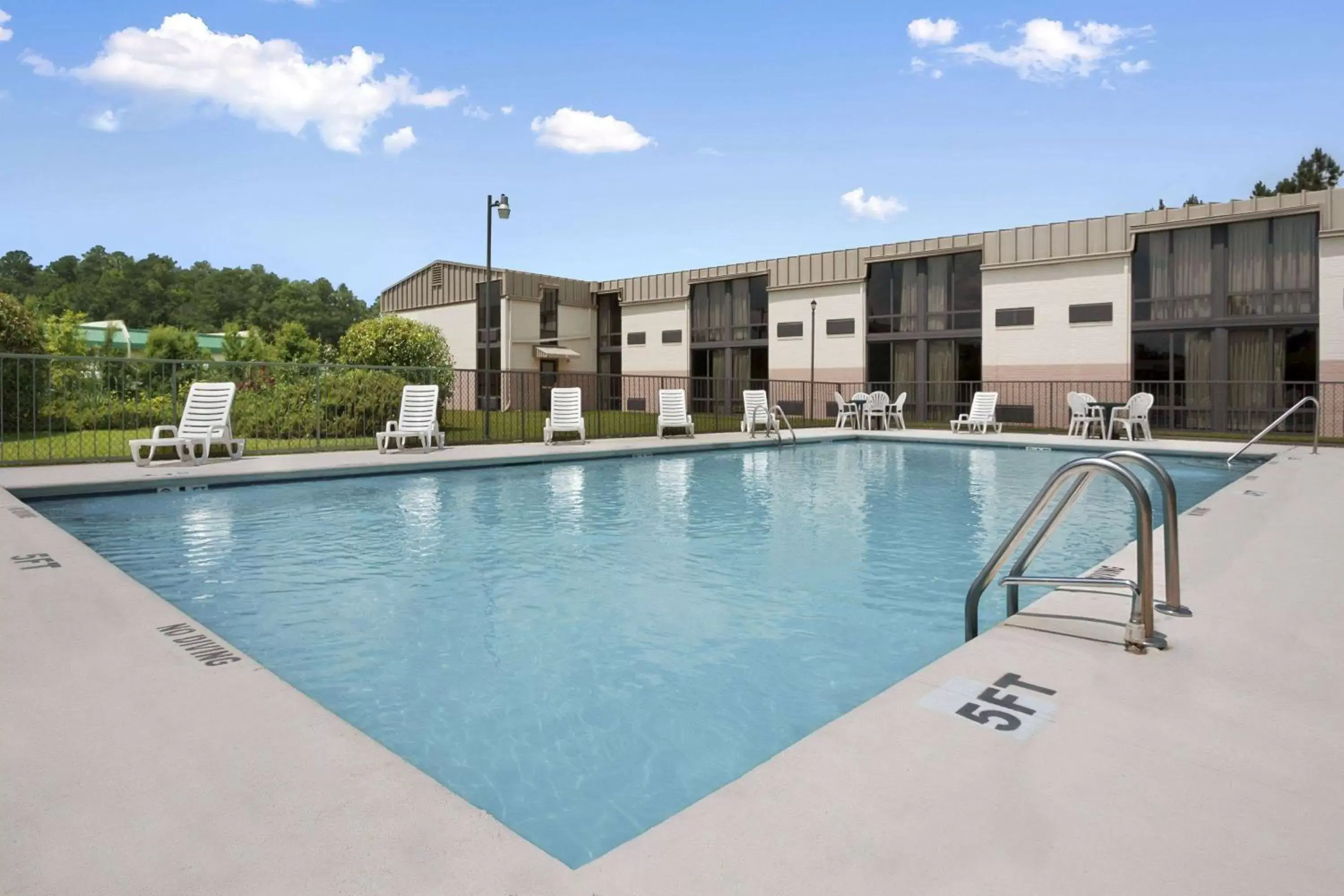 Pool view, Swimming Pool in Days Inn by Wyndham Fayetteville-South/I-95 Exit 49