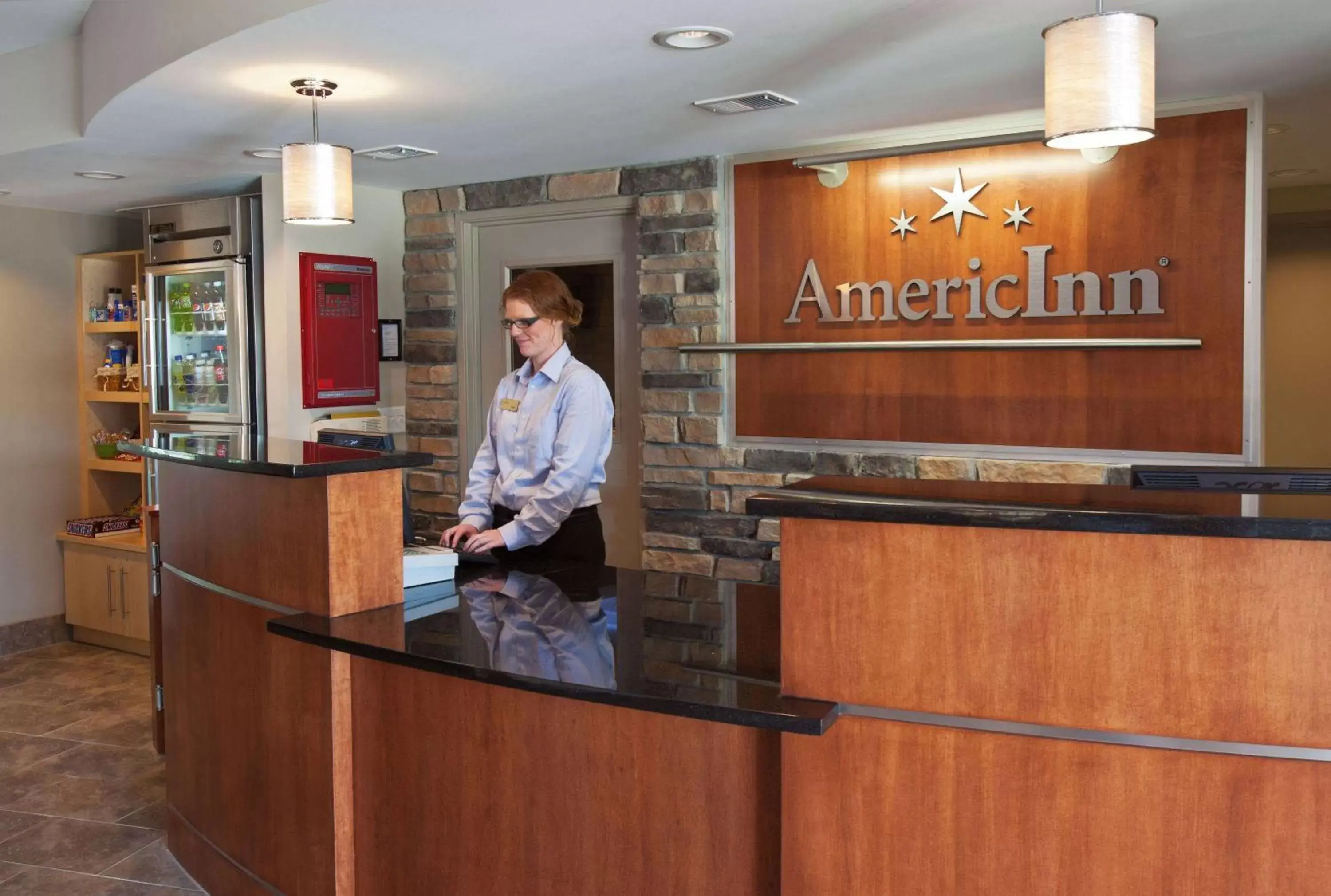 Lobby or reception in AmericInn by Wyndham Fairfield Lobby or reception in AmericInn by Wyndham Fairfield