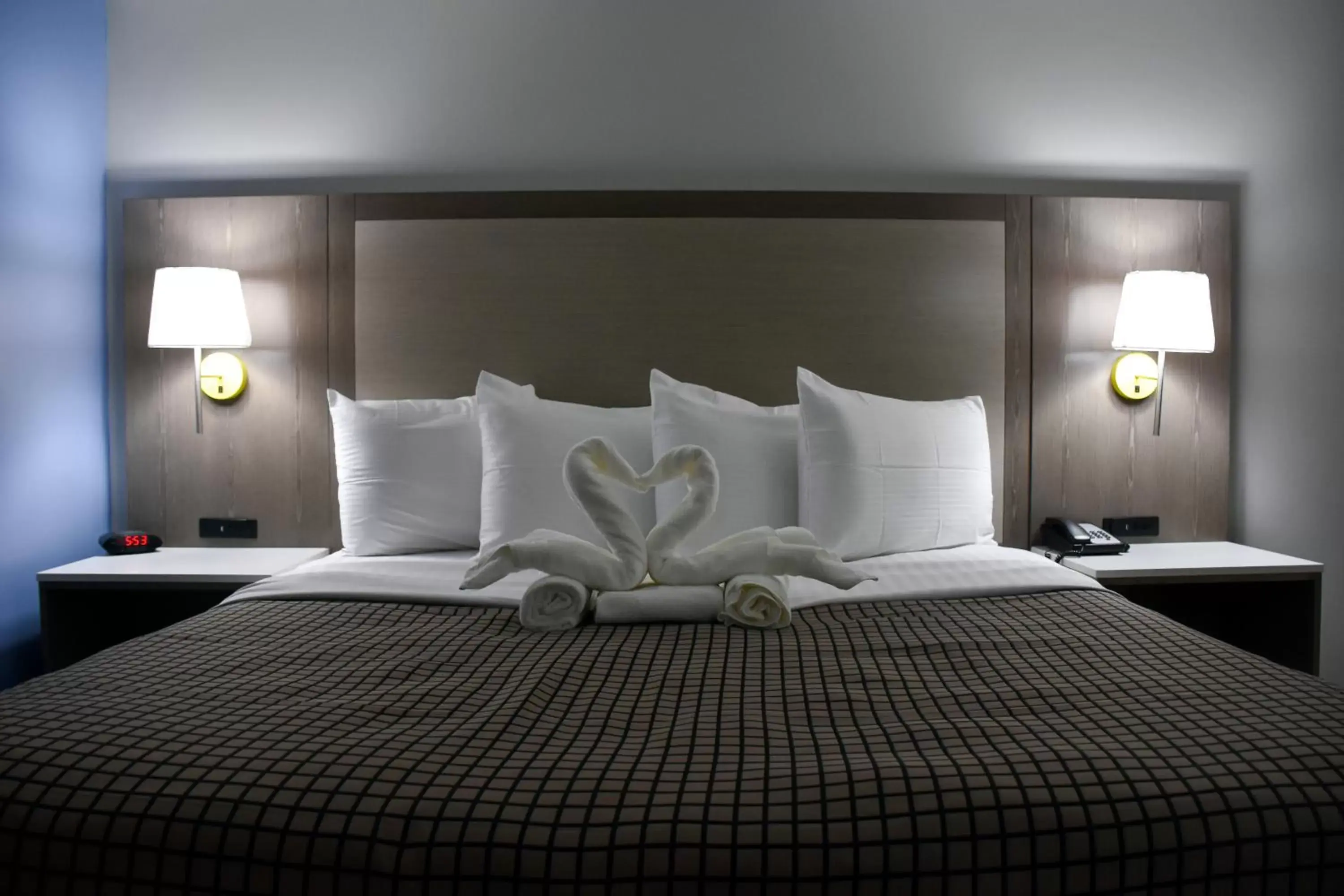 Bed in Destin Inn & Suites