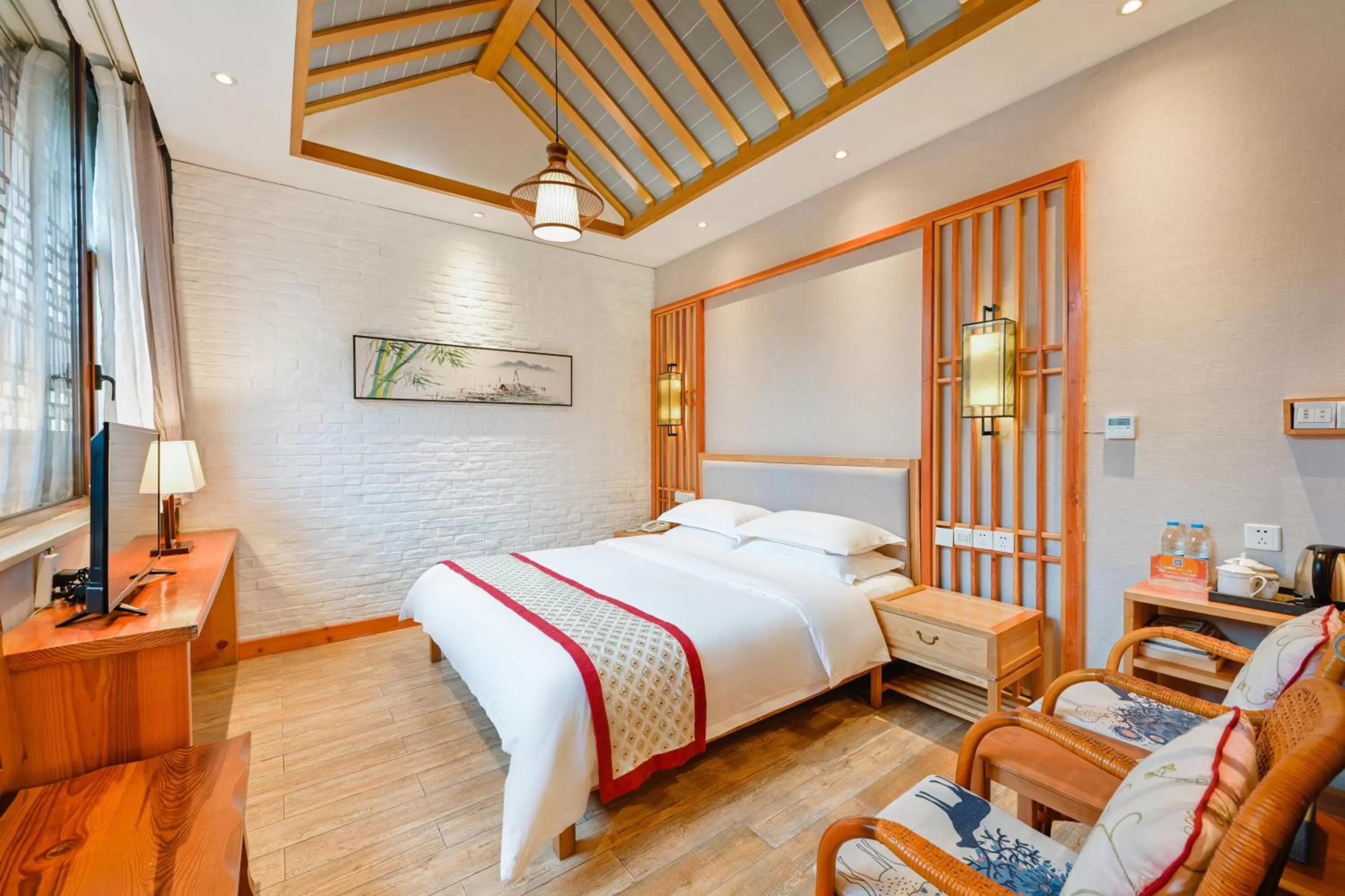 Bed in Mild Spring Boutique Hotel