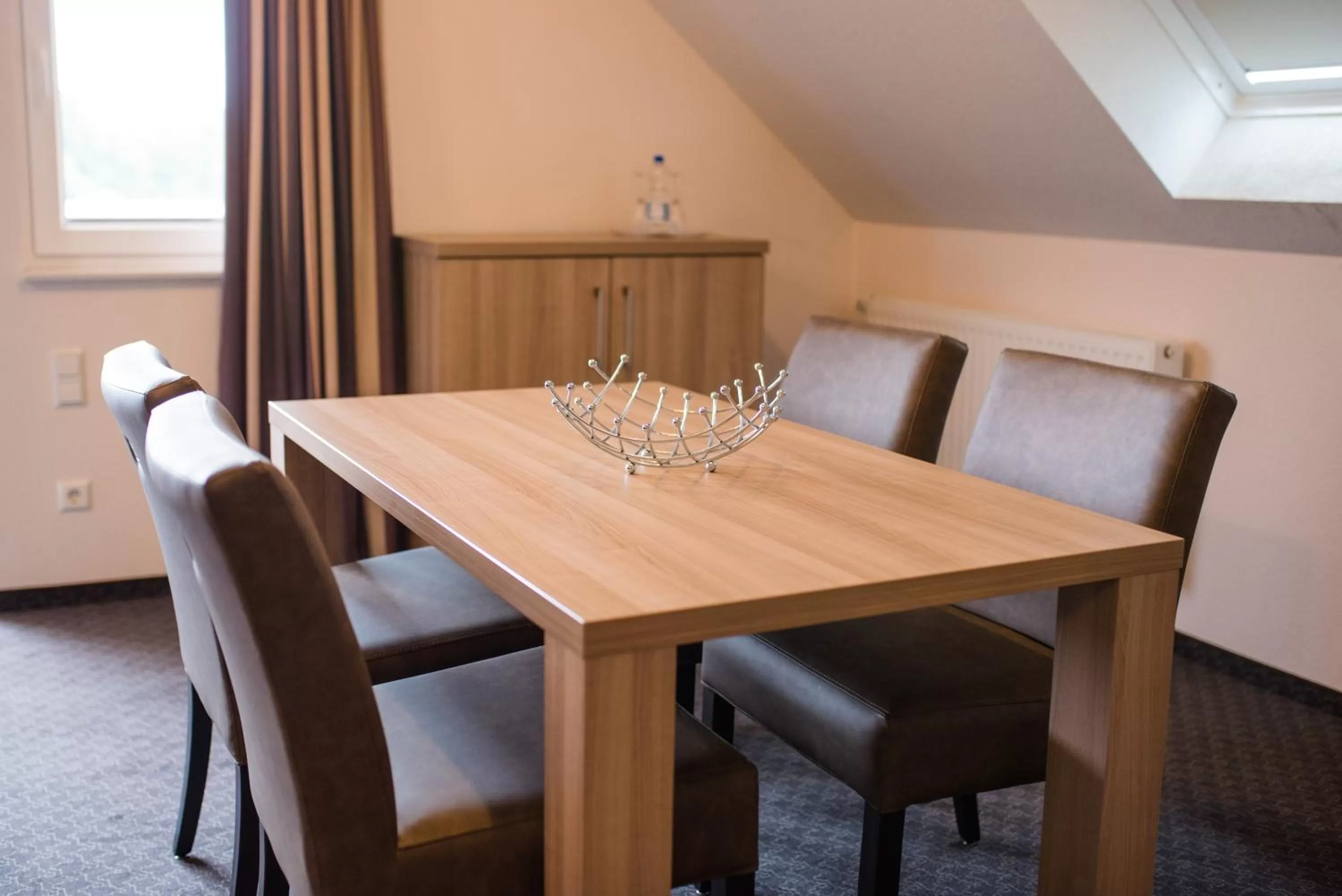 Photo of the whole room, Dining Area in Hotel Heilemann