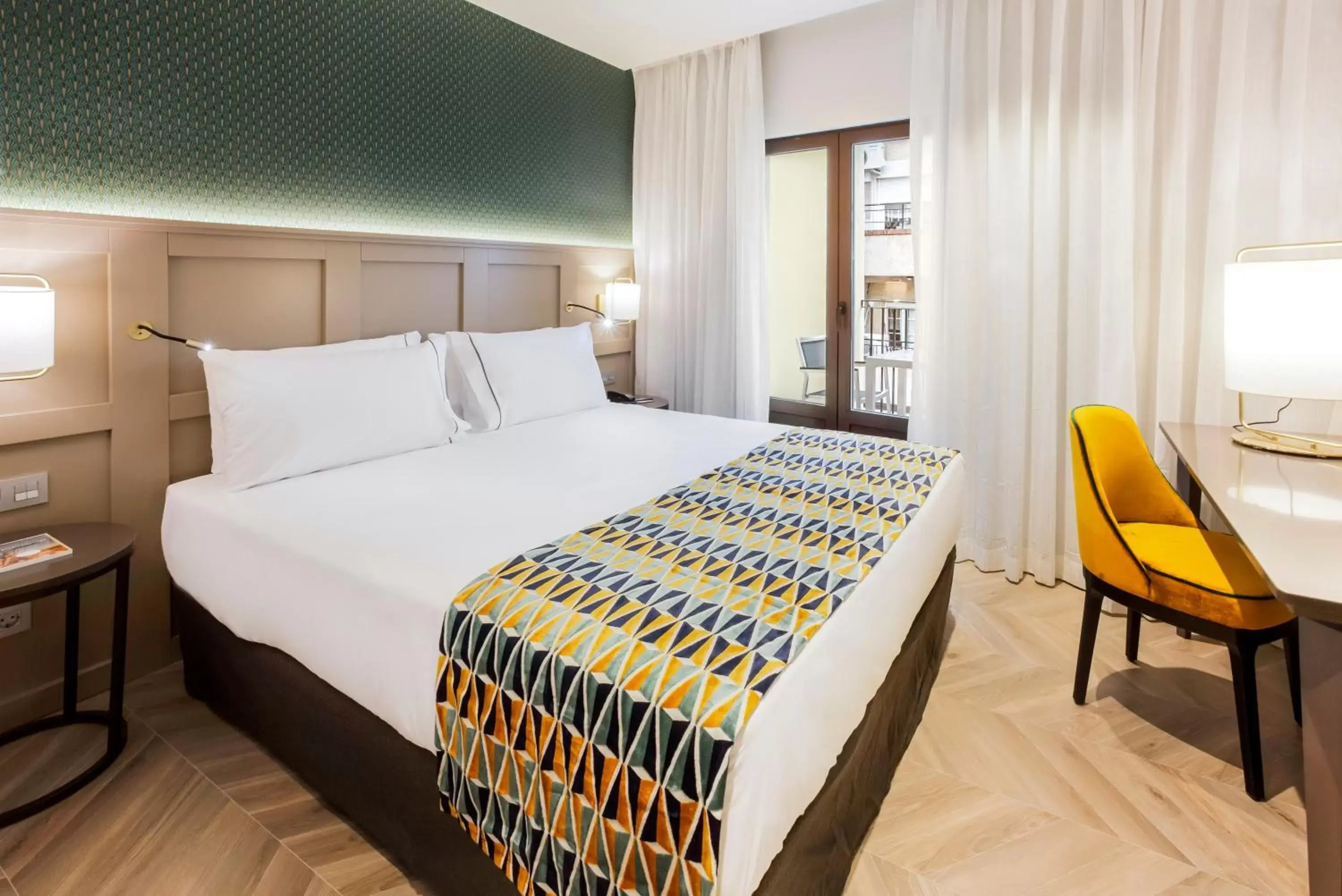 Photo of the whole room, Bed in Eurostars Puerta Real