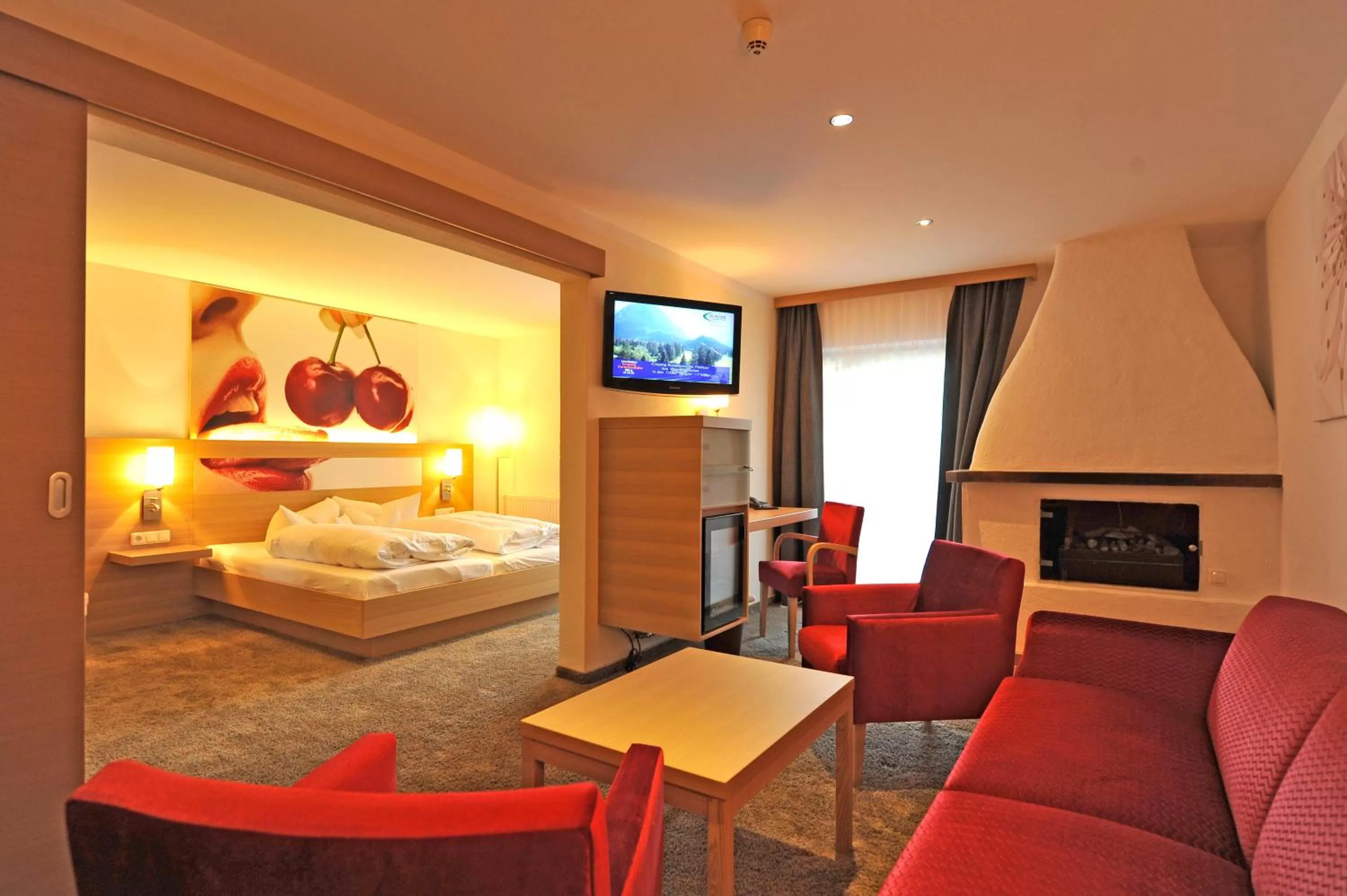 Living room, Bed in Geniesserhotel Alpin GmbH