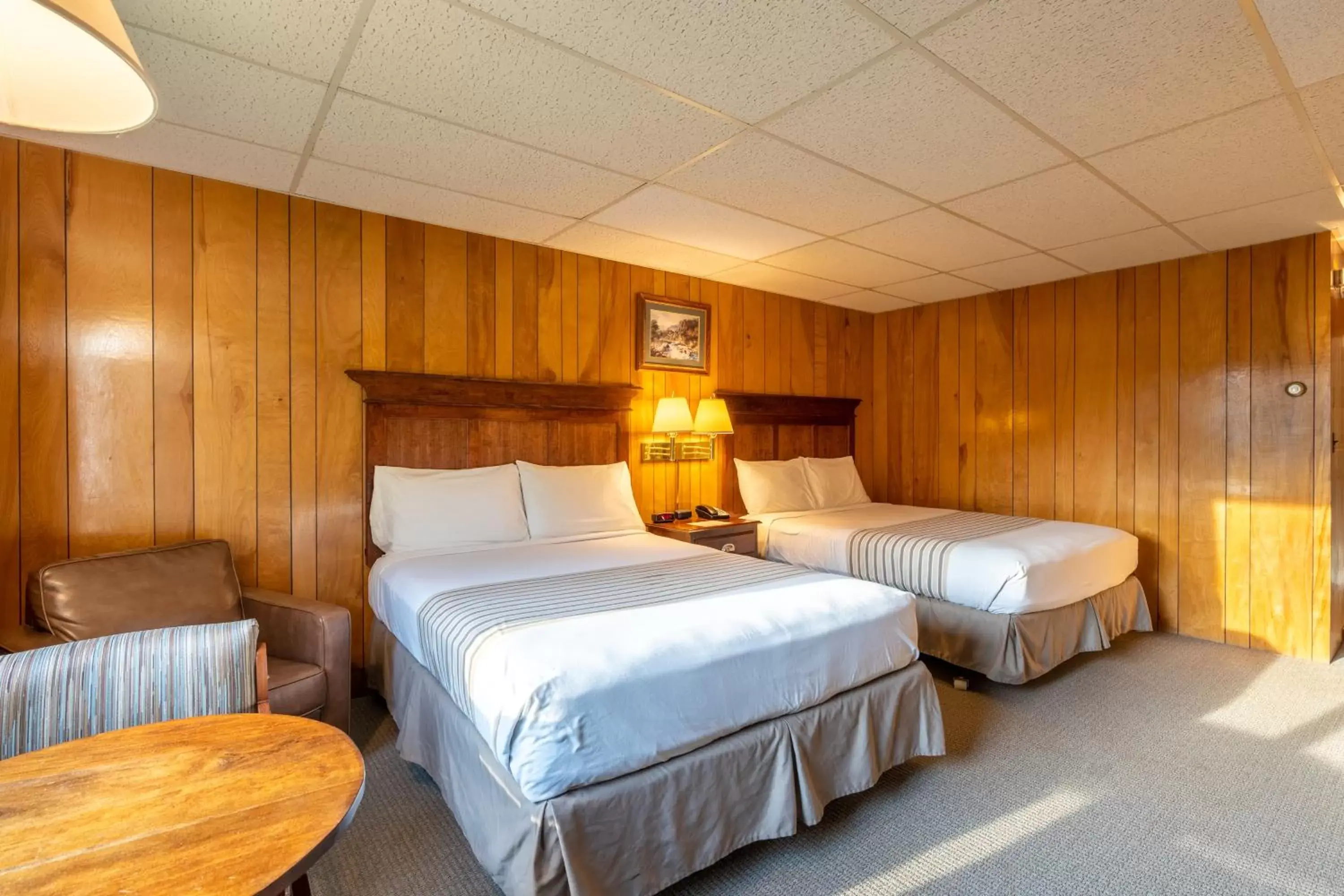 Bed in Shaheen's Adirondack Inn