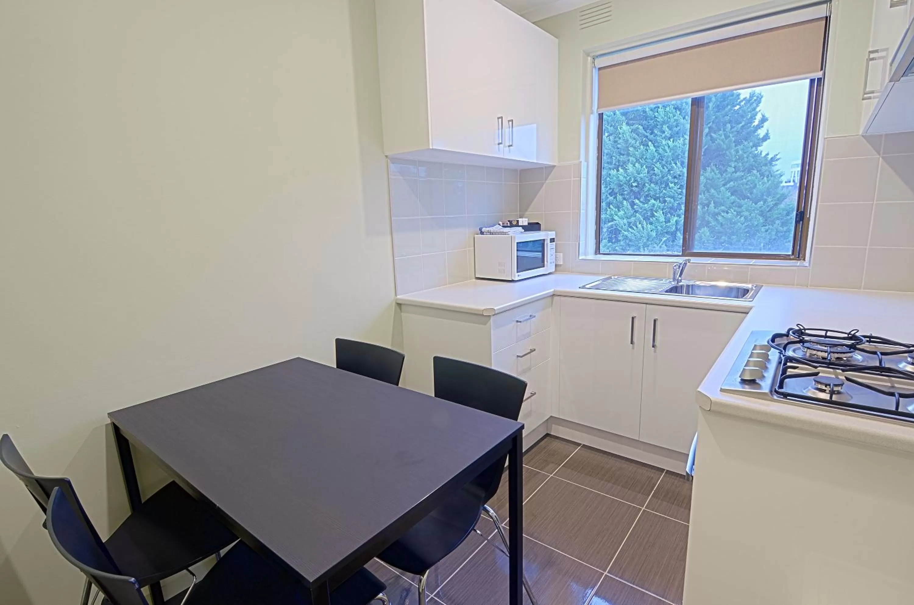 Kitchen or kitchenette in Park Squire Motor Inn & Serviced Apartments