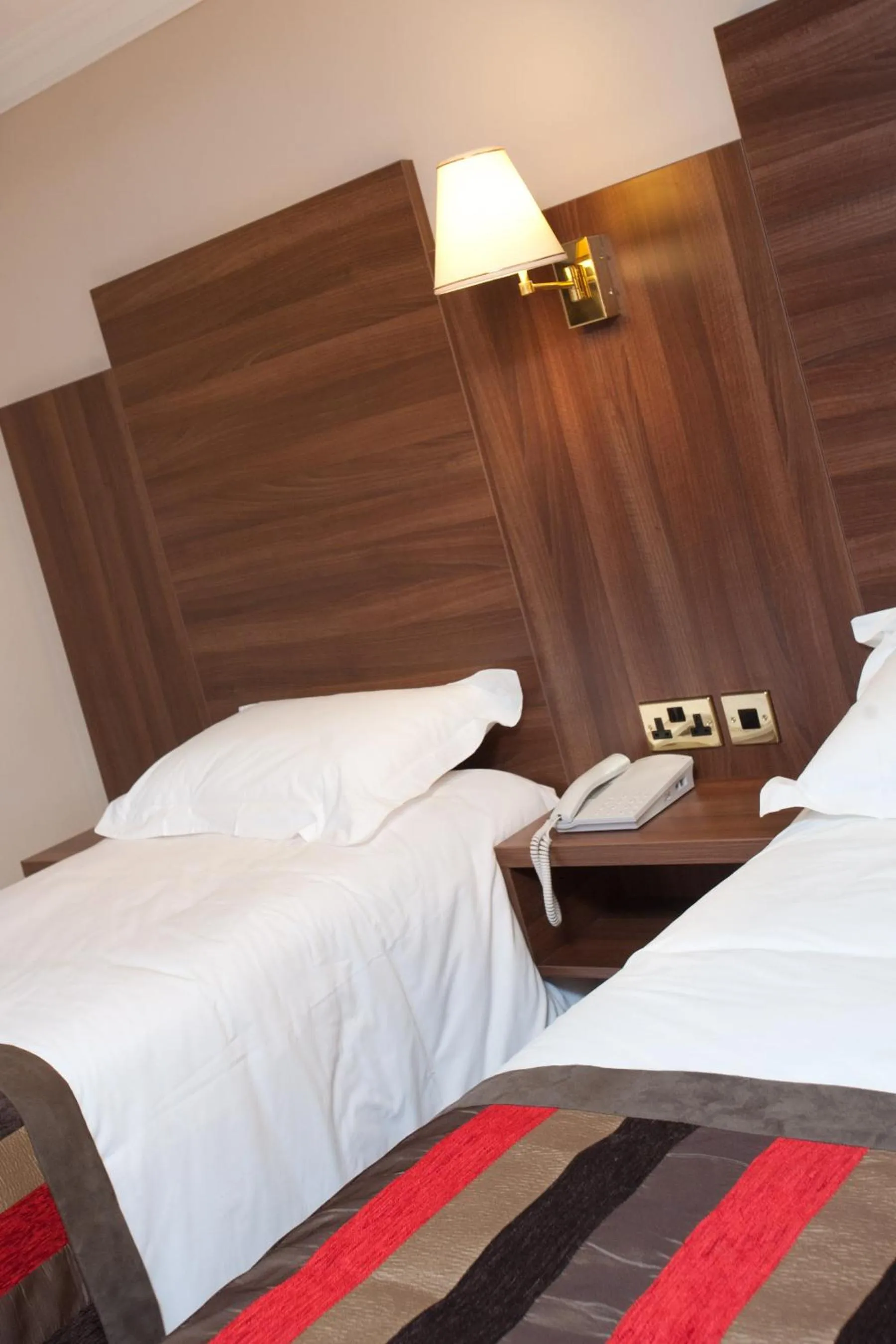 Bed in Adair Arms Hotel